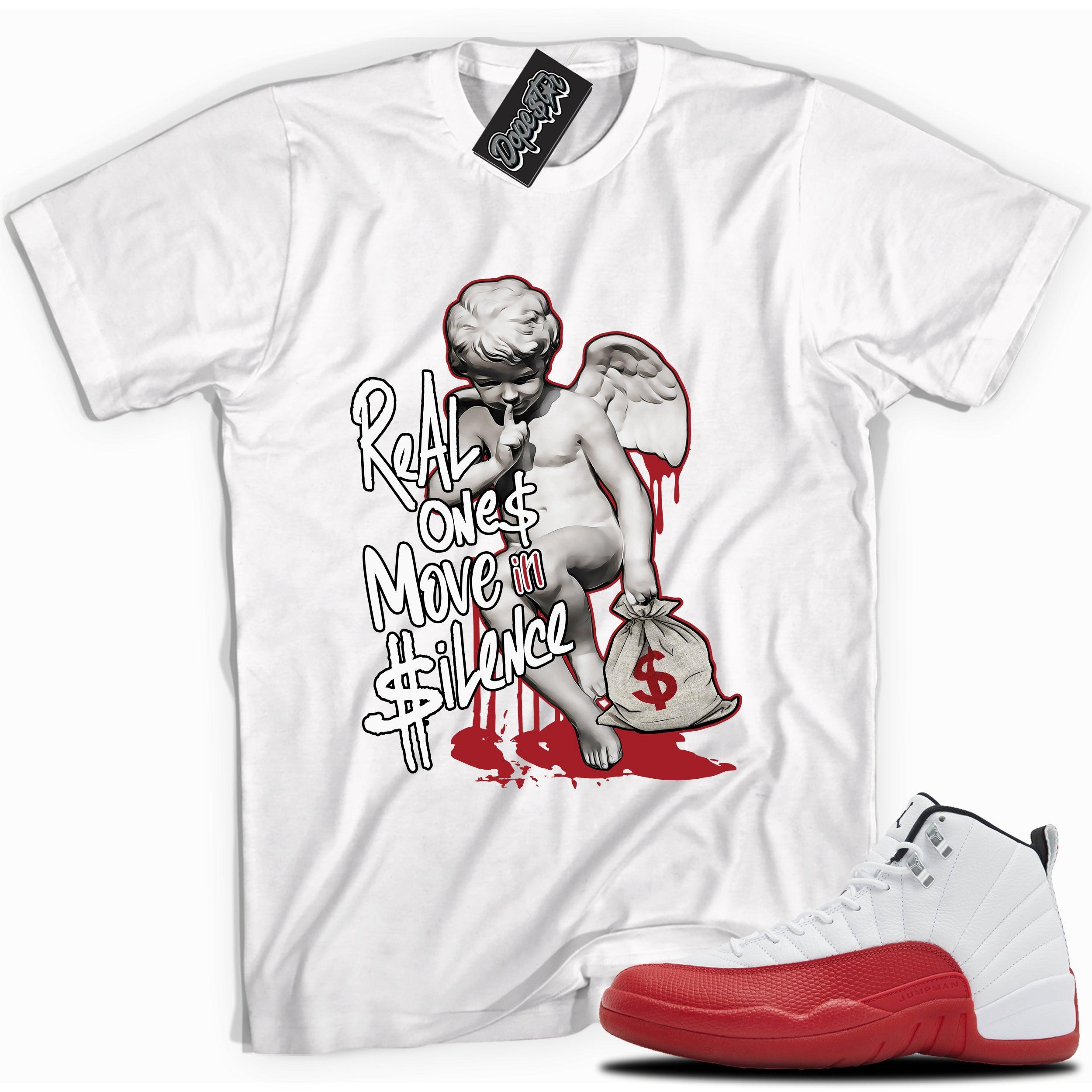 Cool White graphic tee with “REAL ONES CHERUB” print, that perfectly matches Air Jordan 12 Retro Cherry Red 2023 red and white sneakers