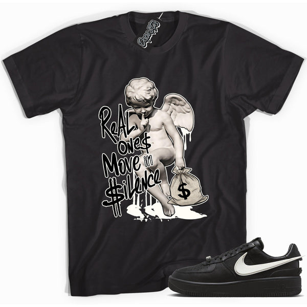 Cool black graphic tee with 'real ones move in silence' print, that perfectly matches Nike Air Force 1 Low SP Ambush Phantom sneakers.