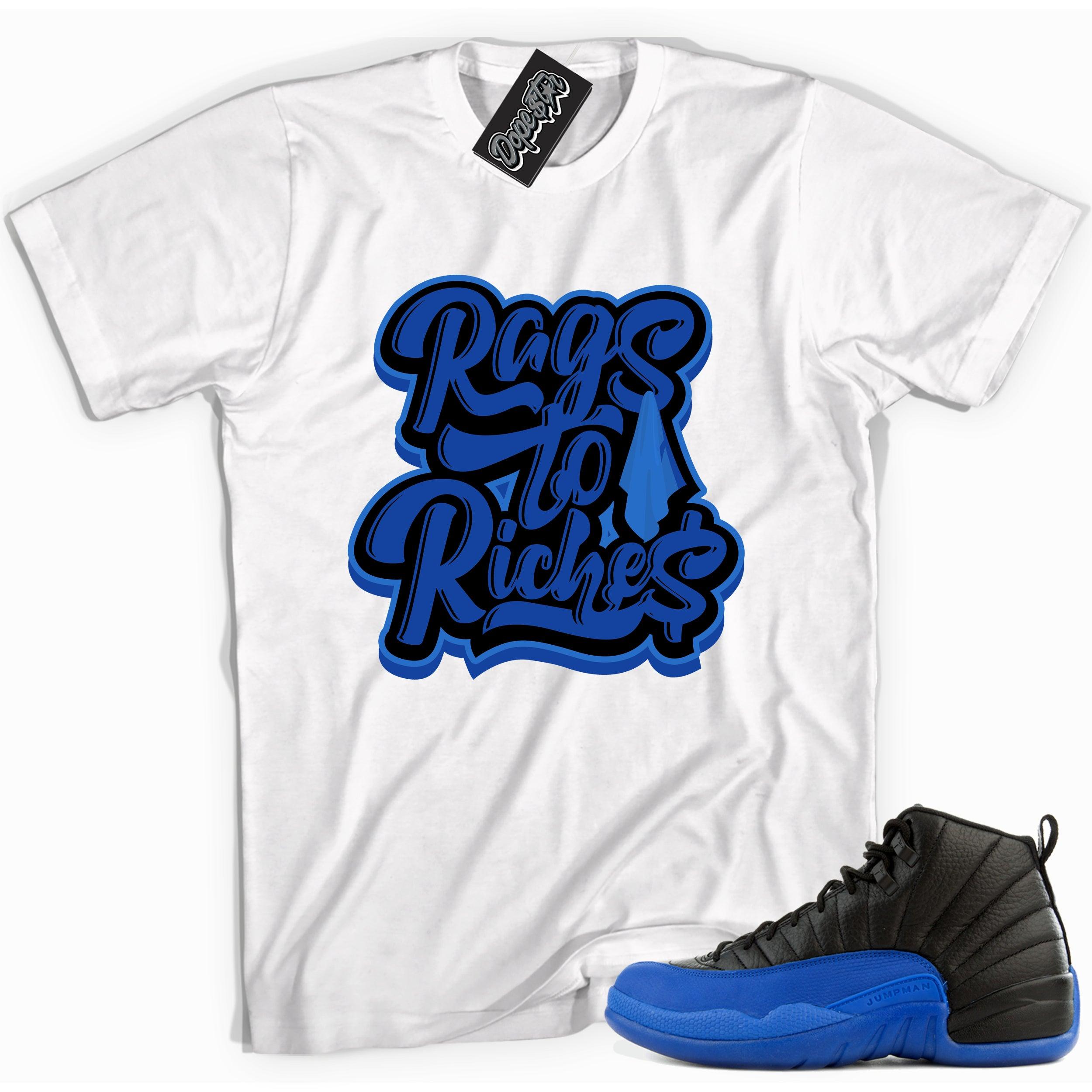 Cool white graphic tee with 'rags to riches' print, that perfectly matches Air Jordan 12 Retro Black Game Royal sneakers.
