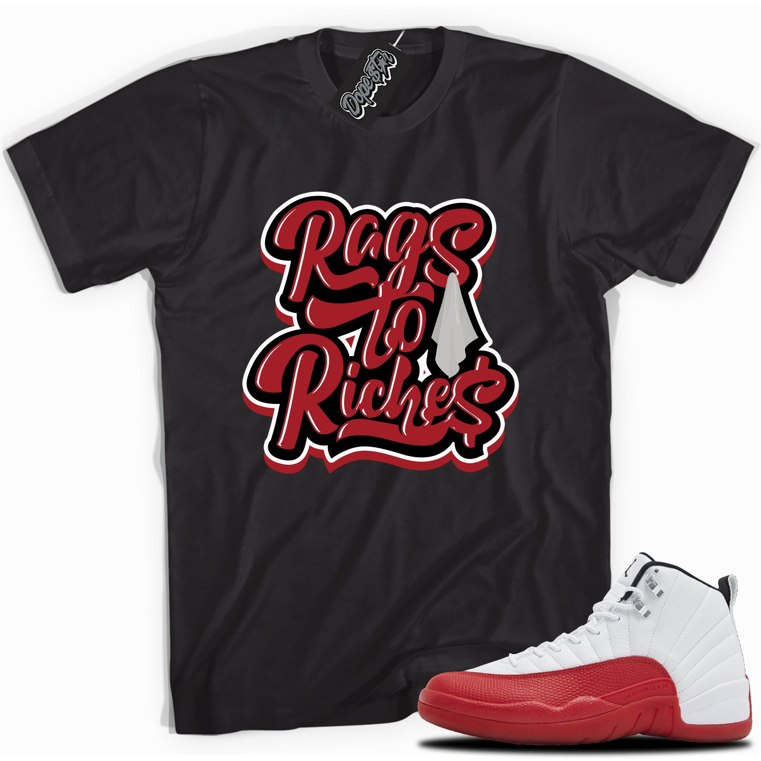 Cool Black graphic tee with “Rags To Riches” print, that perfectly matches Air Jordan 12 Retro Cherry Red 2023 red and white sneakers