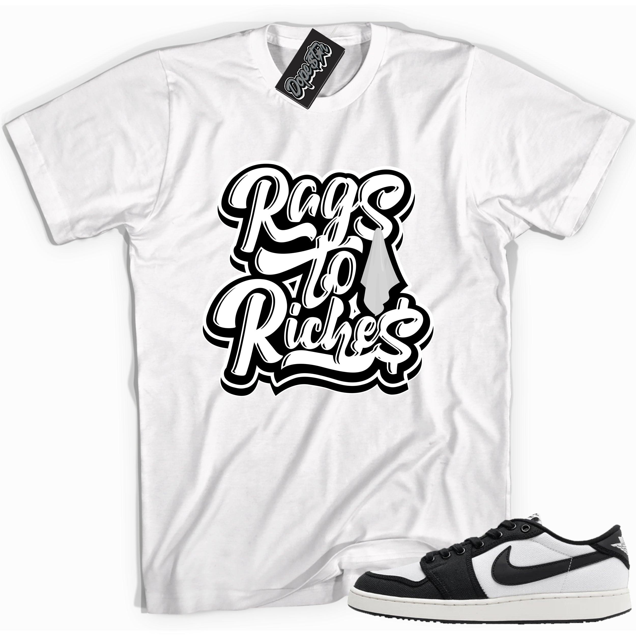 Cool white graphic tee with 'rags to riches' print, that perfectly matches Air Jordan 1 Retro Ajko Low Black & White sneakers.