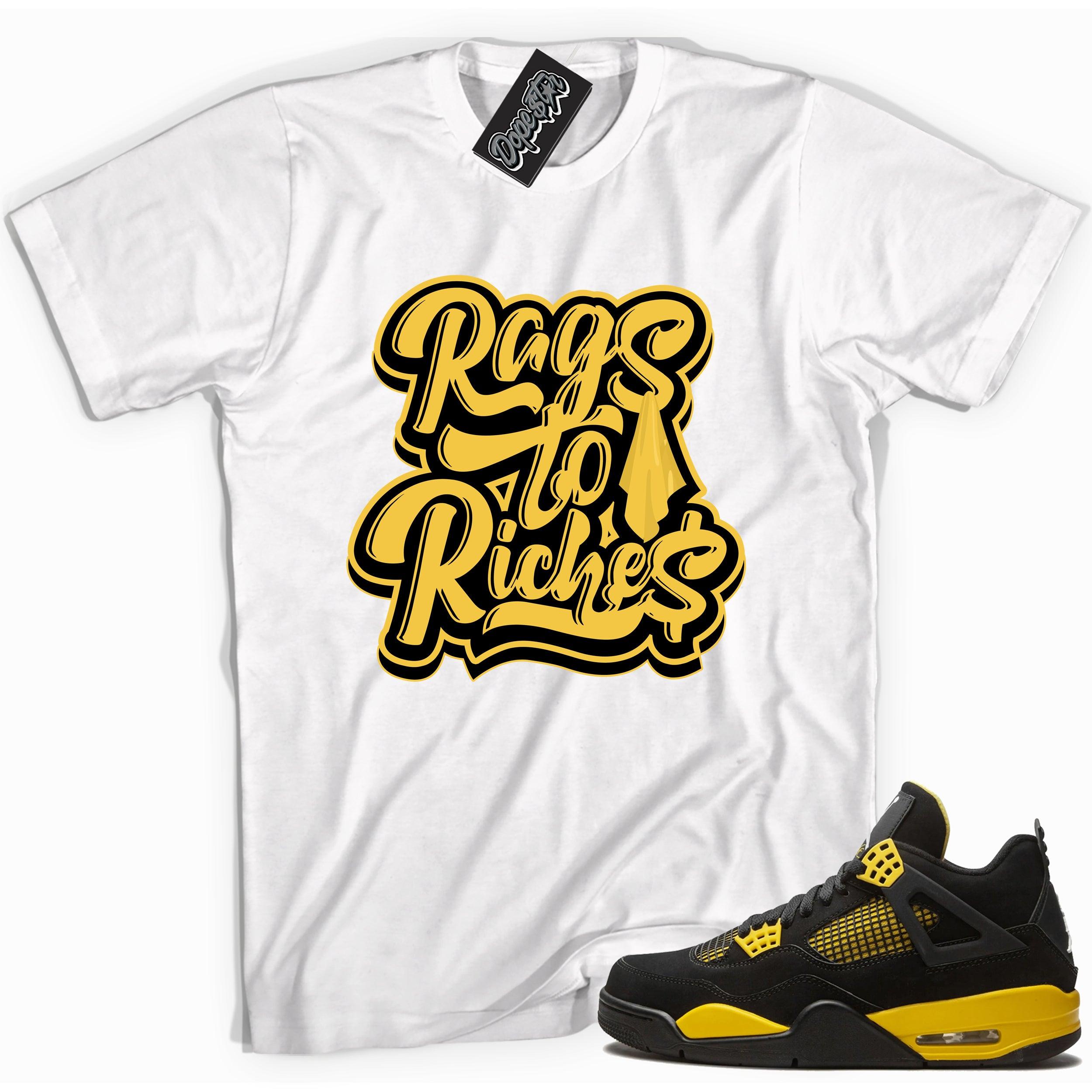 Cool white  graphic tee with 'rags to riches' print, that perfectly matches Air Jordan 4 Thunder sneakers