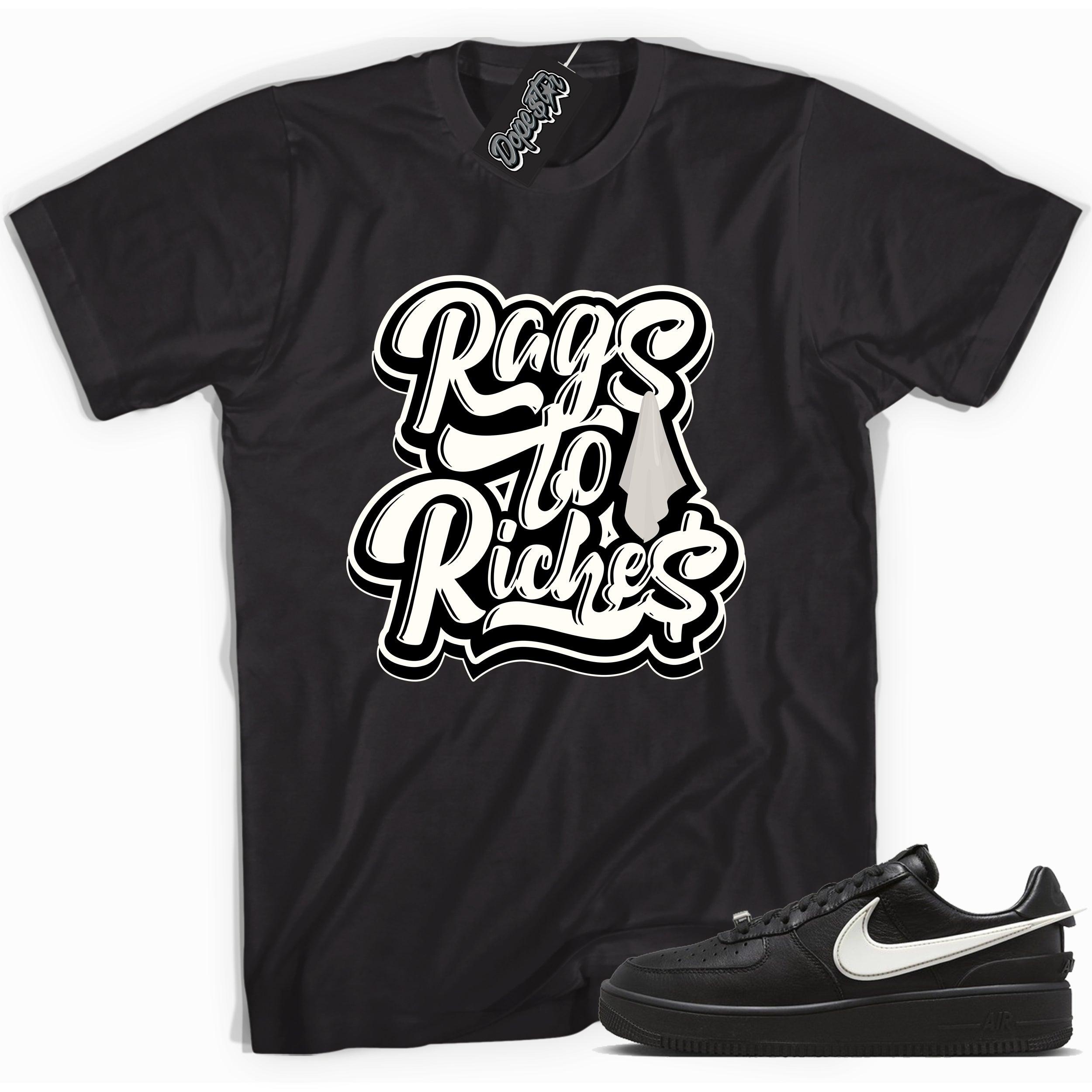 Cool black graphic tee with 'rags to riches' print, that perfectly matches Nike Air Force 1 Low SP Ambush Phantom sneakers.