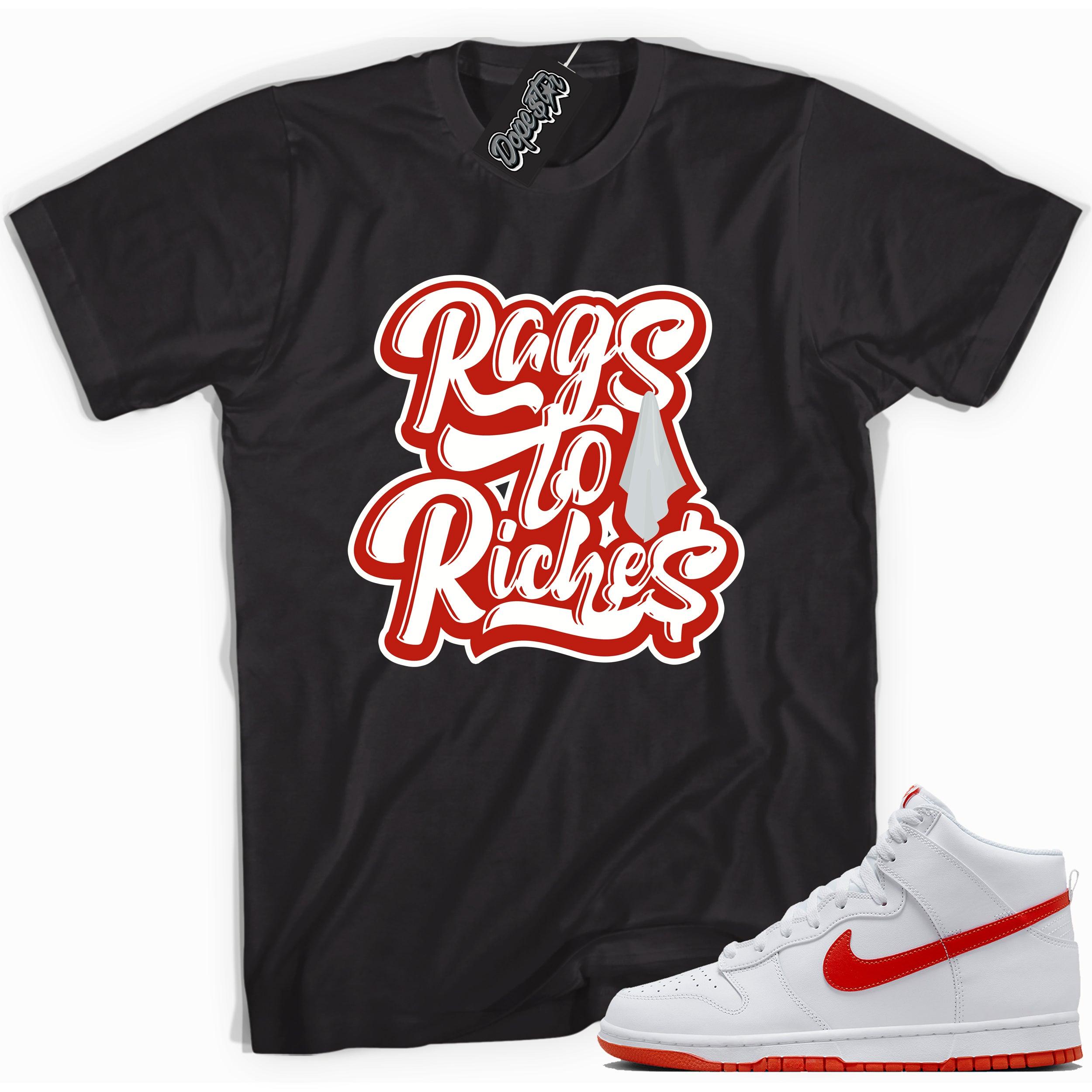 Cool black graphic tee with 'rags to riches' print, that perfectly matches Nike Dunk High White Picante Red sneakers.