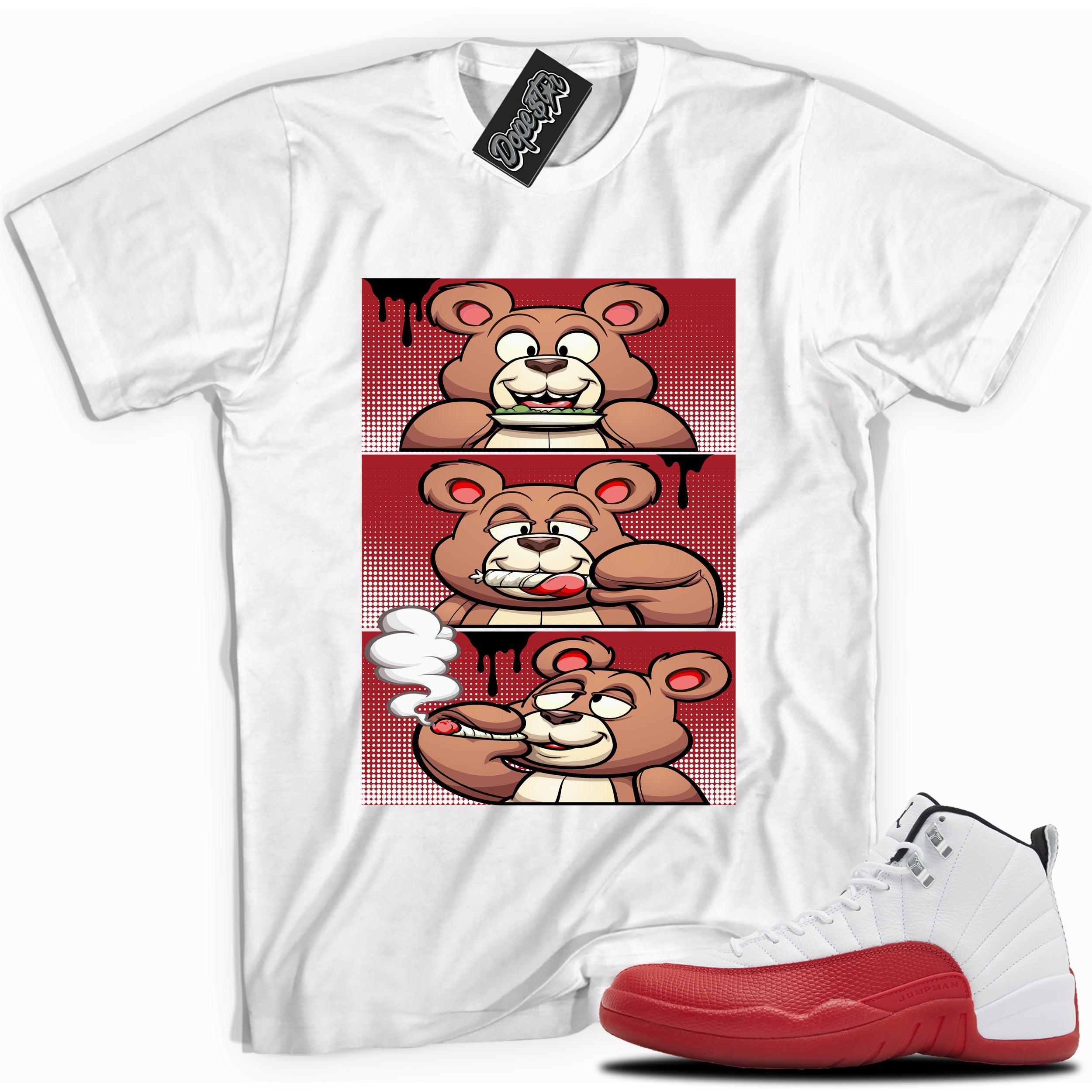 Cool White graphic tee with “Roll It Lick It Smoke It” print, that perfectly matches Air Jordan 12 Retro Cherry Red 2023 red and white sneakers