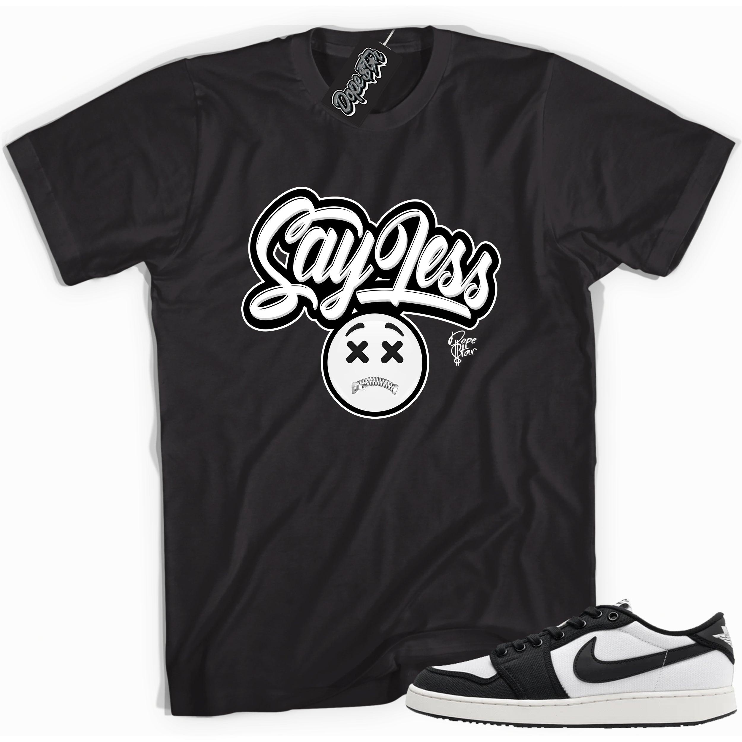 Cool black graphic tee with 'sayless' print, that perfectly matches Air Jordan 1 Retro Ajko Low Black & White sneakers.