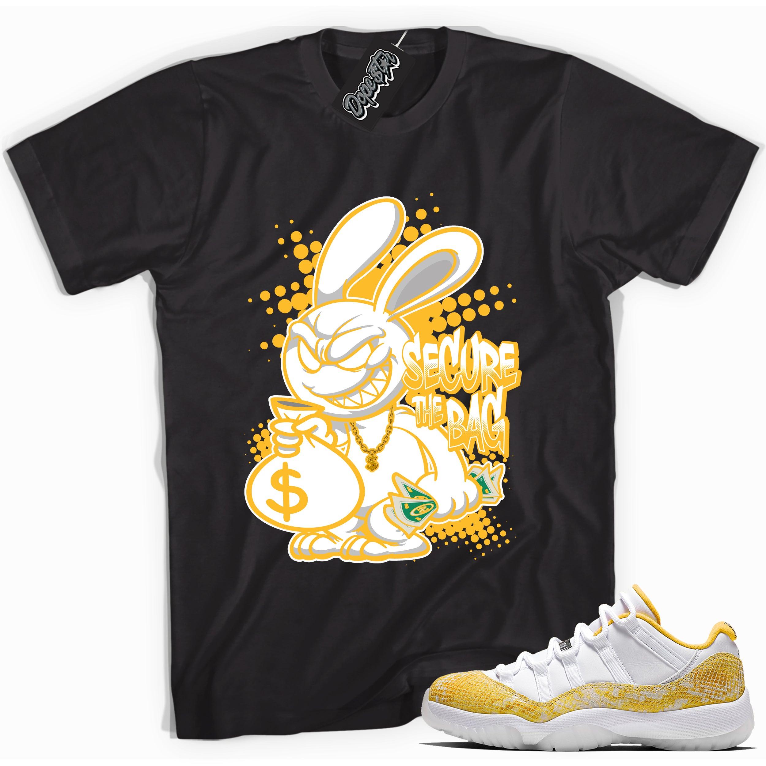 Cool black graphic tee with 'secure the bag' print, that perfectly matches  Air Jordan 11 Retro Low Yellow Snakeskin sneakers