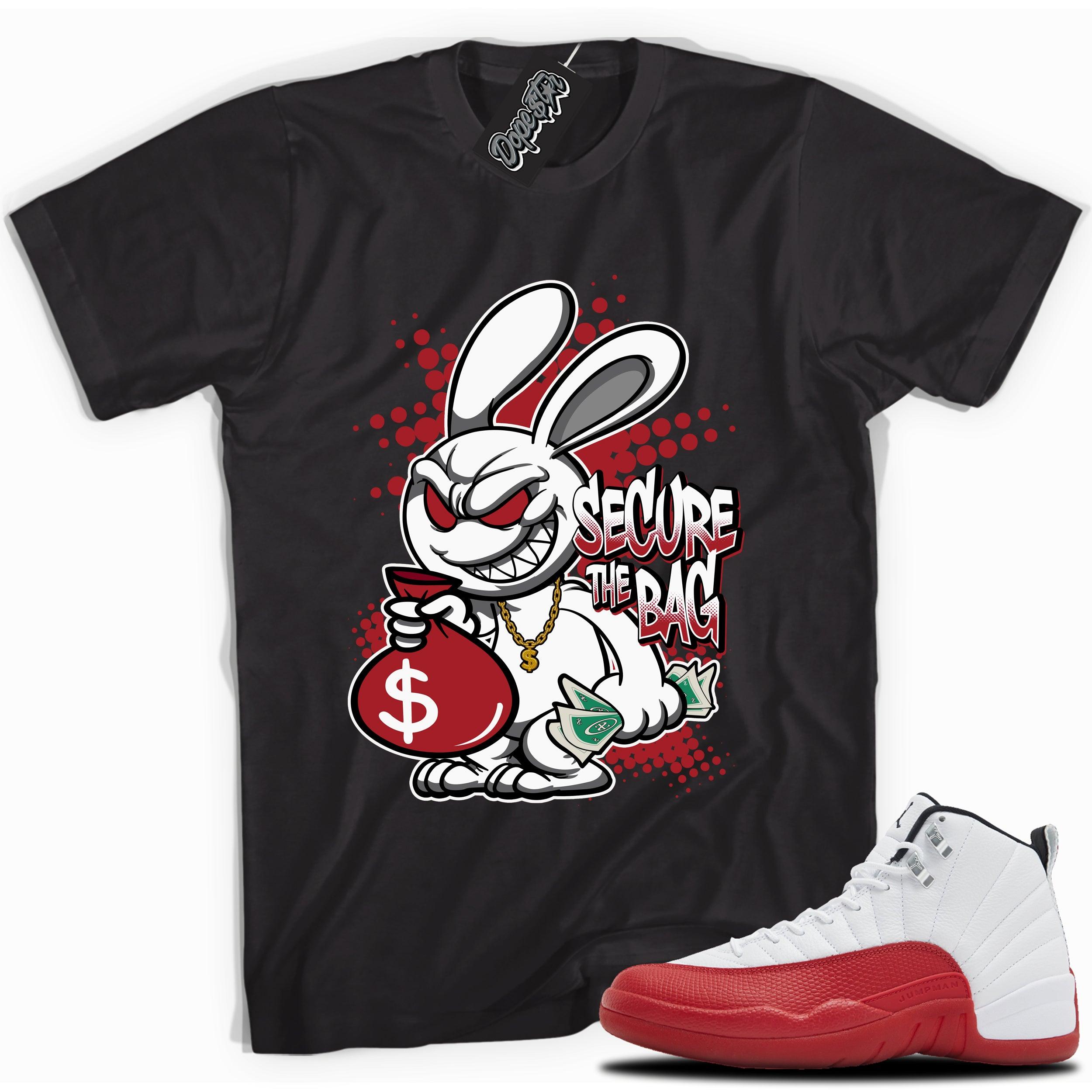 Cool Black graphic tee with “SECURE THE BAG” print, that perfectly matches Air Jordan 12 Retro Cherry Red 2023 red and white sneakers 