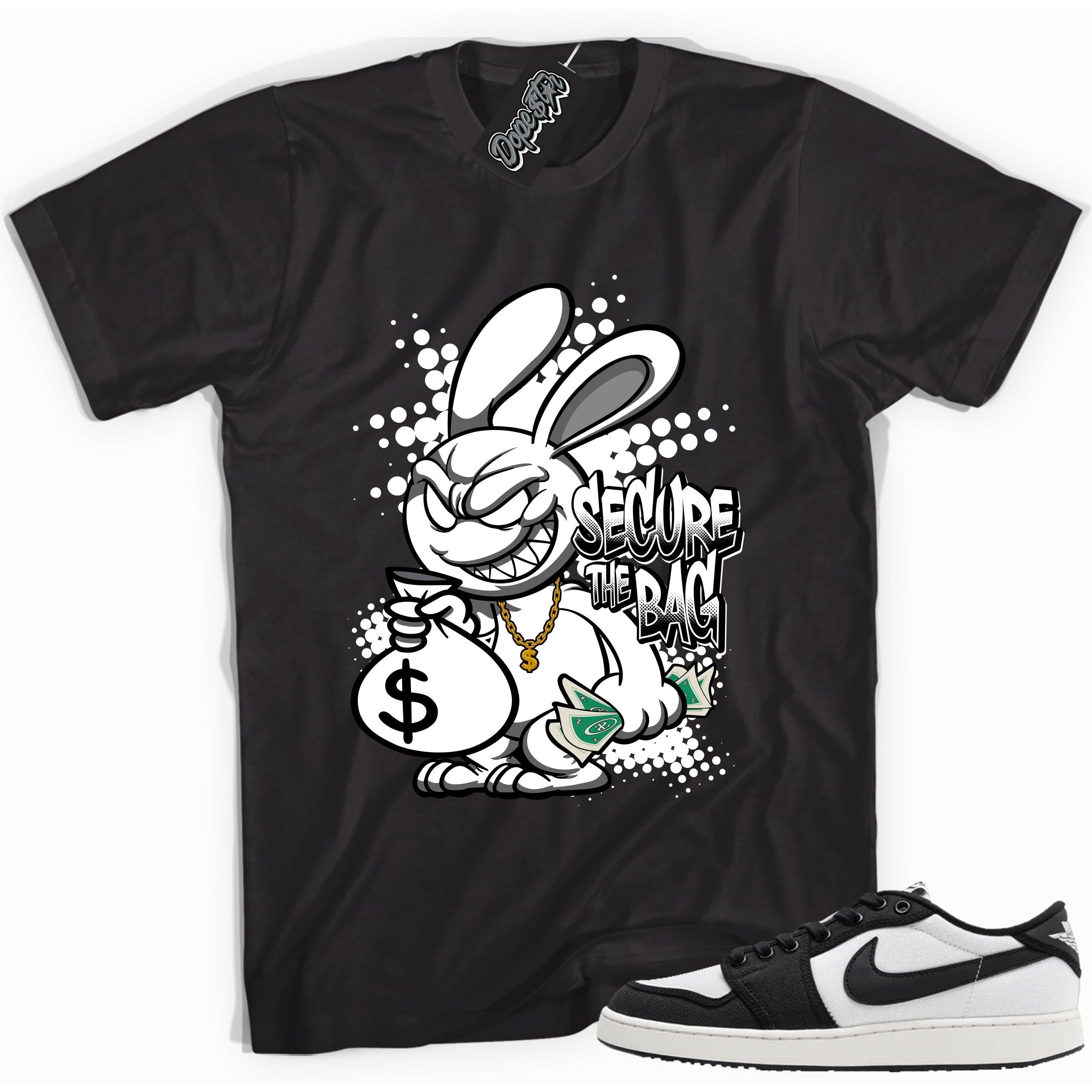 Cool black graphic tee with 'secure the bag' print, that perfectly matches Air Jordan 1 Retro Ajko Low Black & White sneakers.