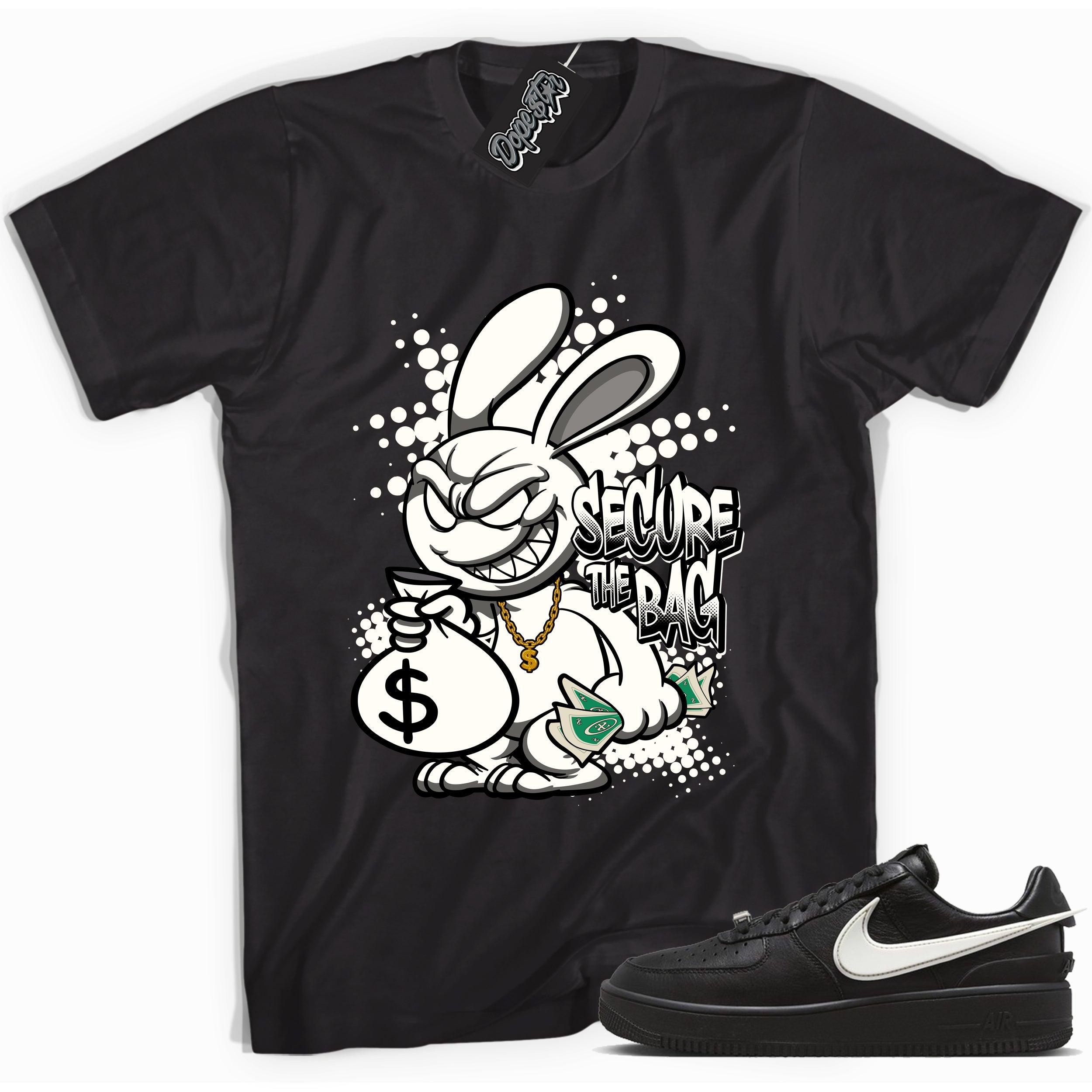 Cool black graphic tee with 'secure the bag' print, that perfectly matches Nike Air Force 1 Low SP Ambush Phantom sneakers.
