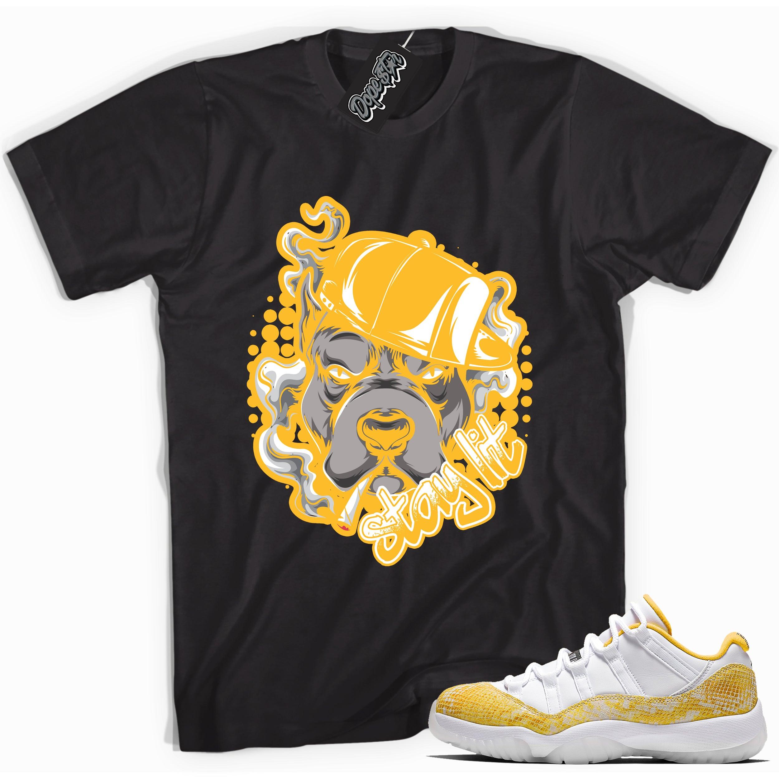 Cool black graphic tee with 'stay lit' print, that perfectly matches  Air Jordan 11 Retro Low Yellow Snakeskin sneakers