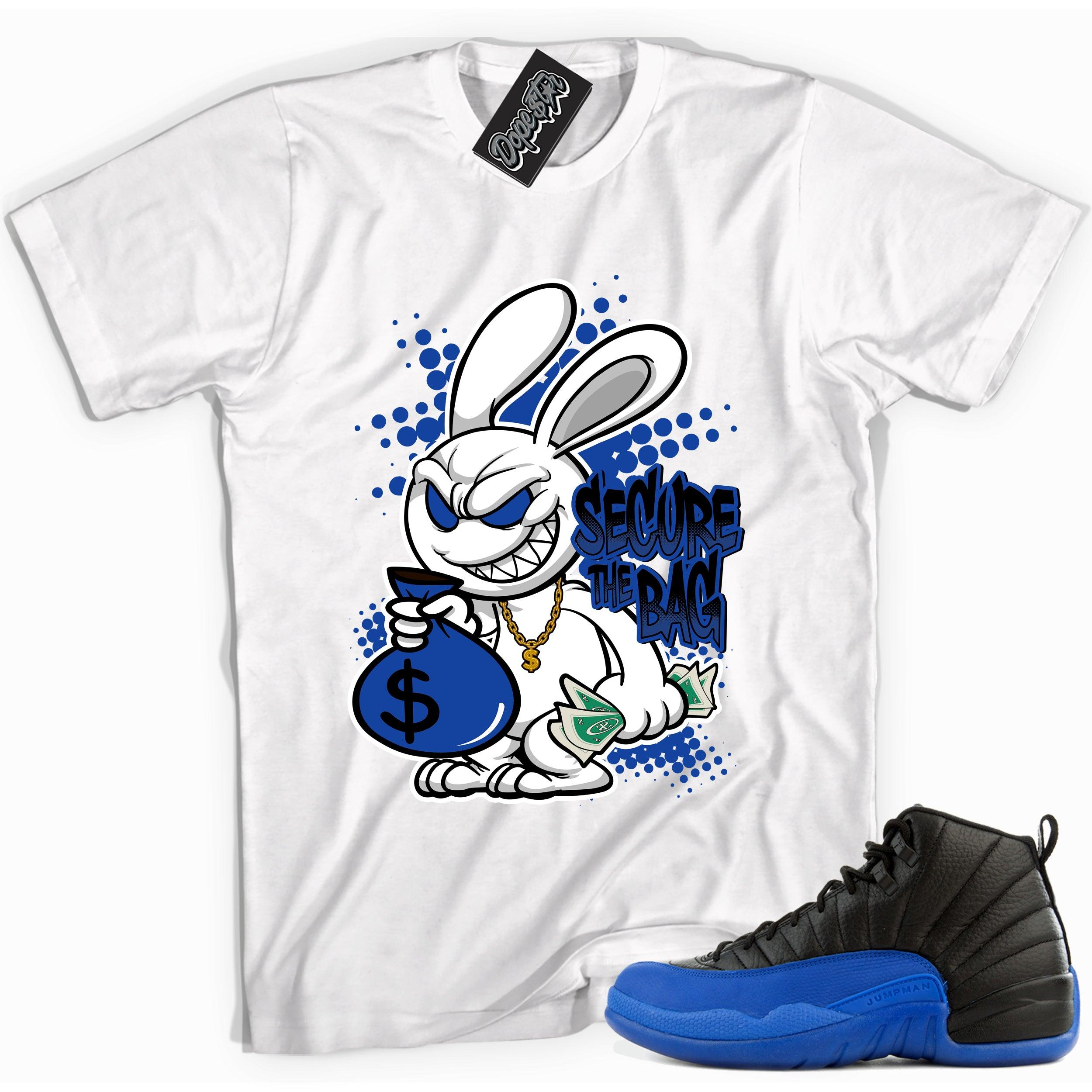 Cool white graphic tee with 'secure the bag' print, that perfectly matches Air Jordan 12 Retro Black Game Royal sneakers.