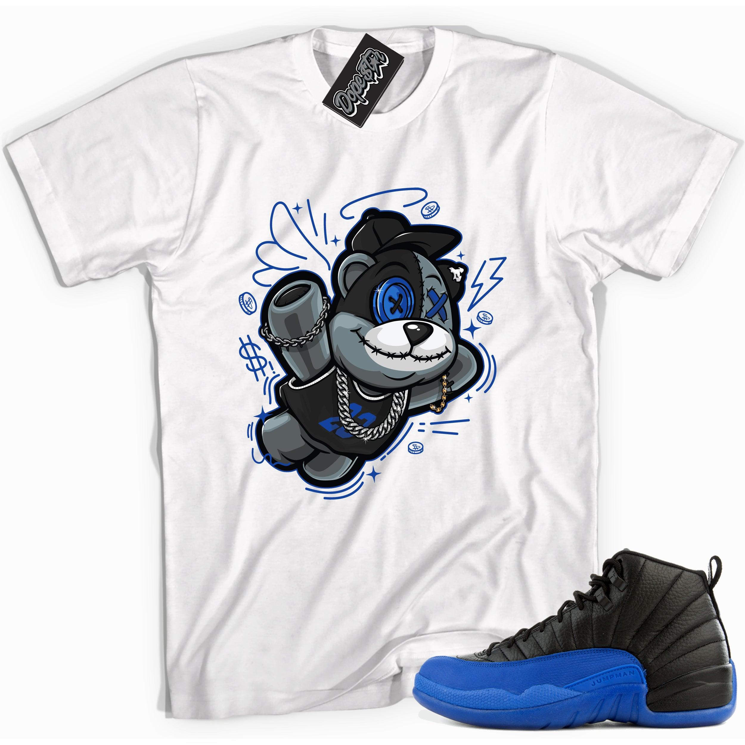 Cool white graphic tee with 'slam dunk bear' print, that perfectly matches Air Jordan 12 Retro Black Game Royal sneakers.