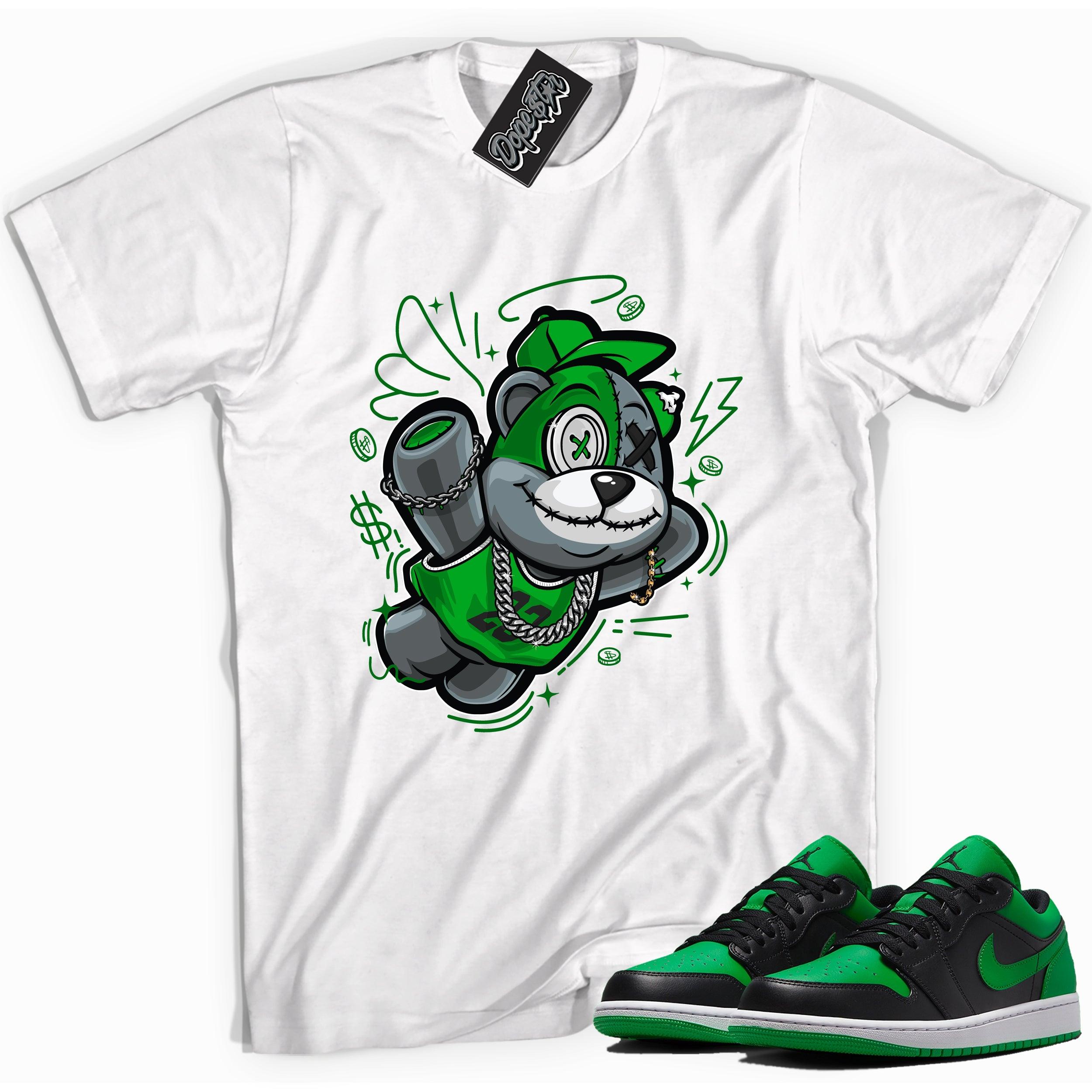 Cool white graphic tee with 'slam dunk bear' print, that perfectly matches Air Jordan 1 Low Lucky Green sneakers