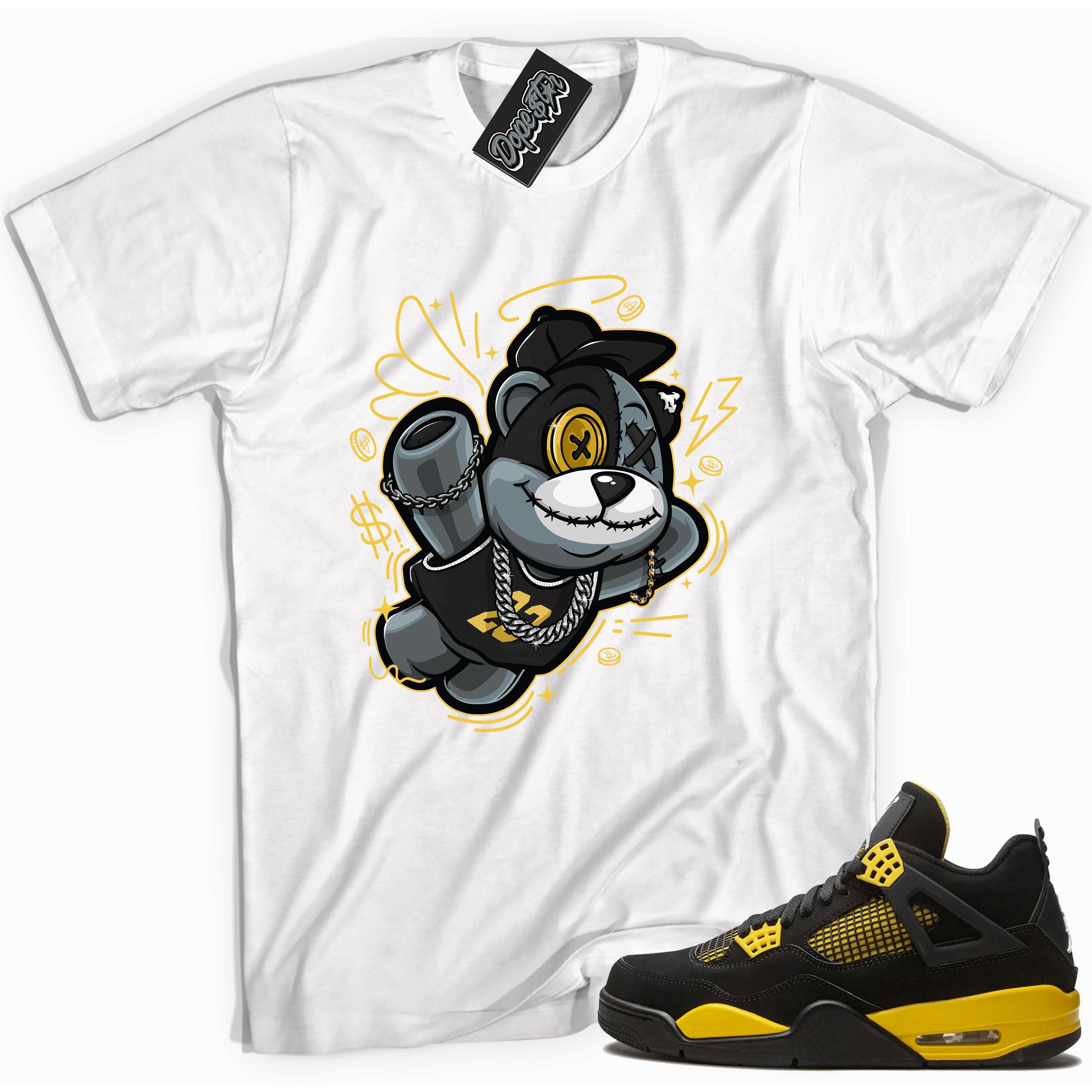 Cool white graphic tee with 'slam dunk bear' print, that perfectly matches Air Jordan 4 Thunder sneakers