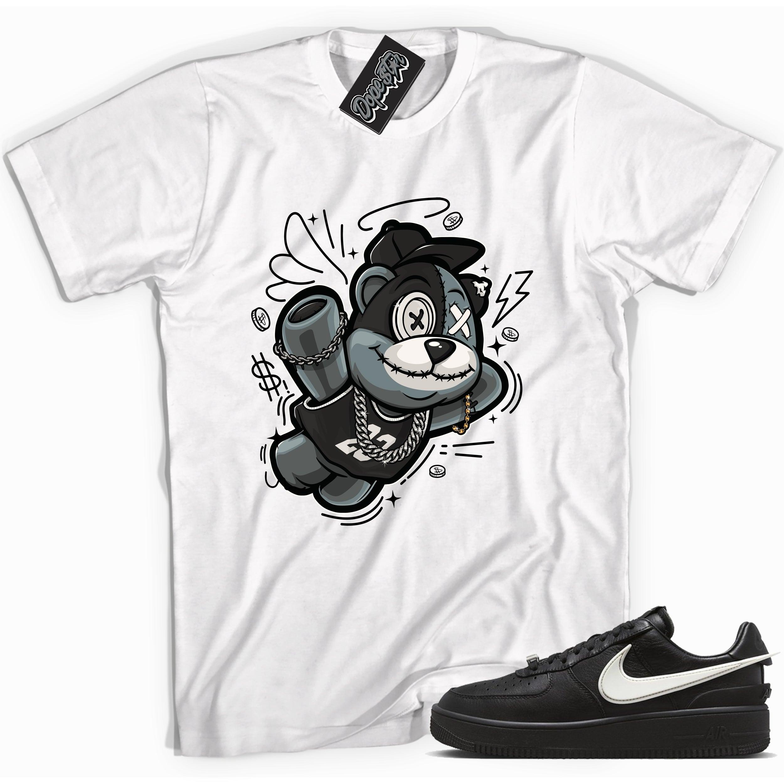 Cool white graphic tee with 'slam dunk bear' print, that perfectly matches Nike Air Force 1 Low SP Ambush Phantom sneakers.