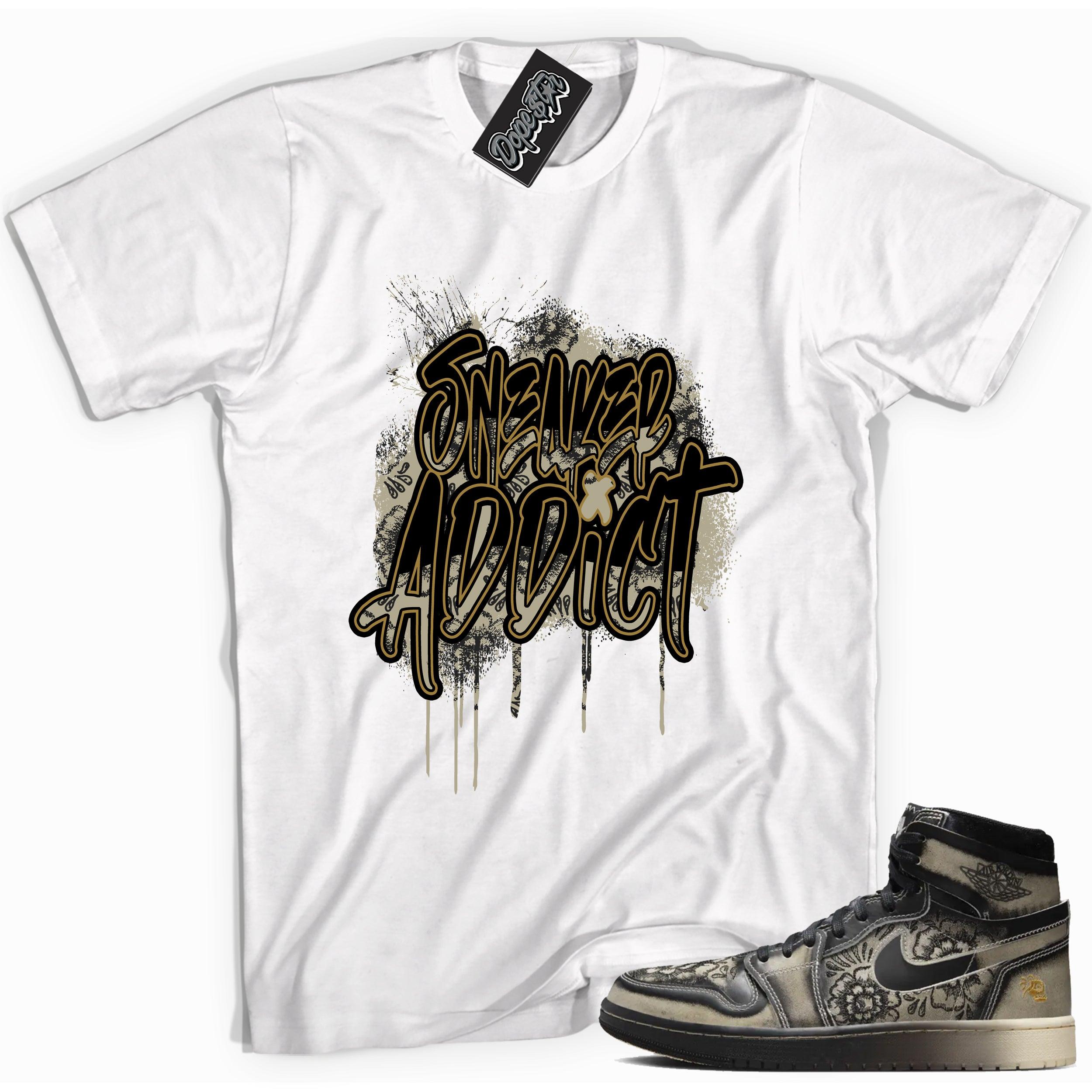 Cool White graphic tee with “ Sneaker Addict ” print, that perfectly matches Air Jordan 1 High Zoom Comfort 2 Dia de Muertos Black and Pale Ivory  sneakers 