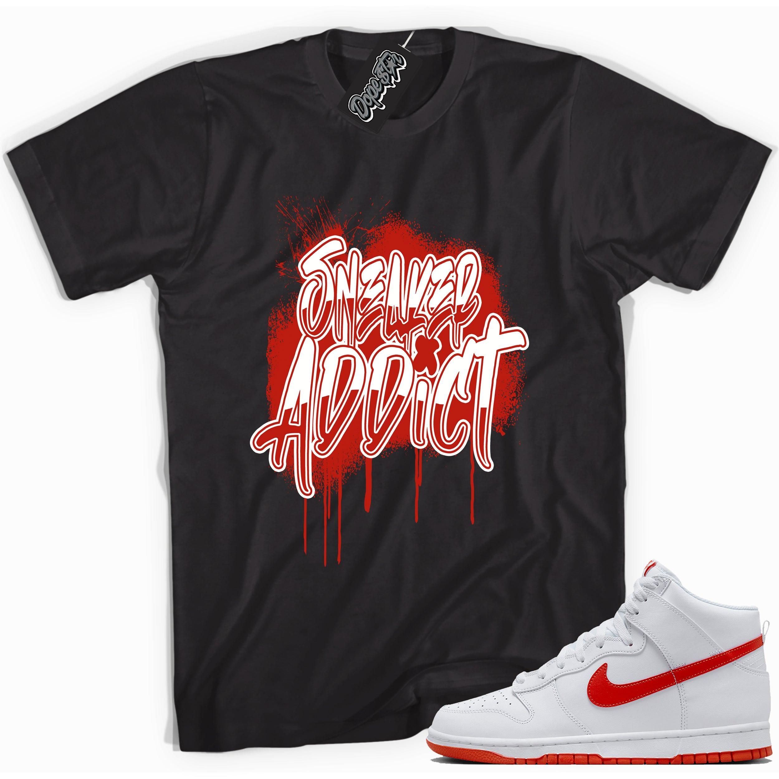 Cool black graphic tee with 'sneaker addict' print, that perfectly matches Nike Dunk High White Picante Red sneakers.