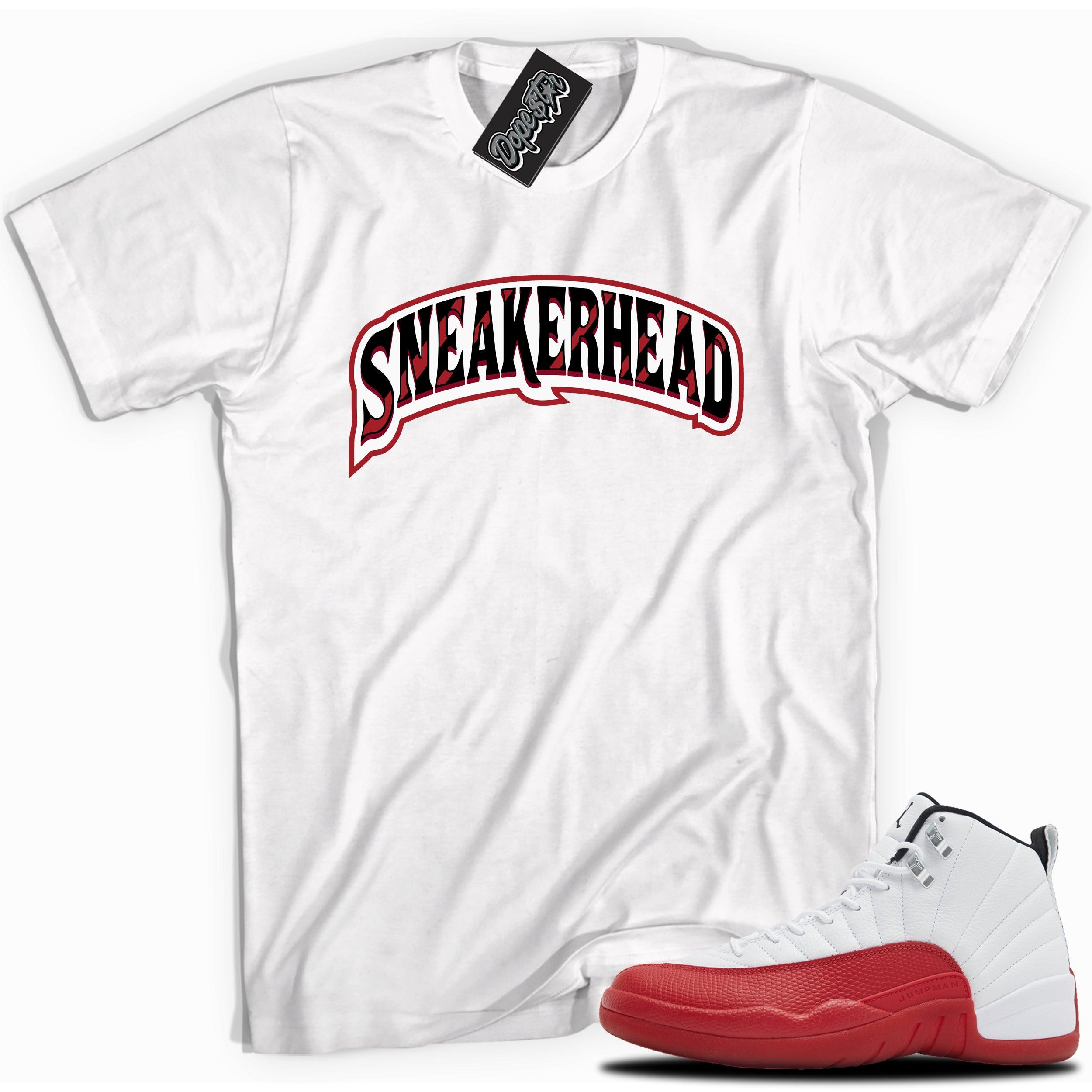 Cool White graphic tee with “Sneaker-Head” print, that perfectly matches Air Jordan 12 Retro Cherry Red 2023 red and white sneakers
