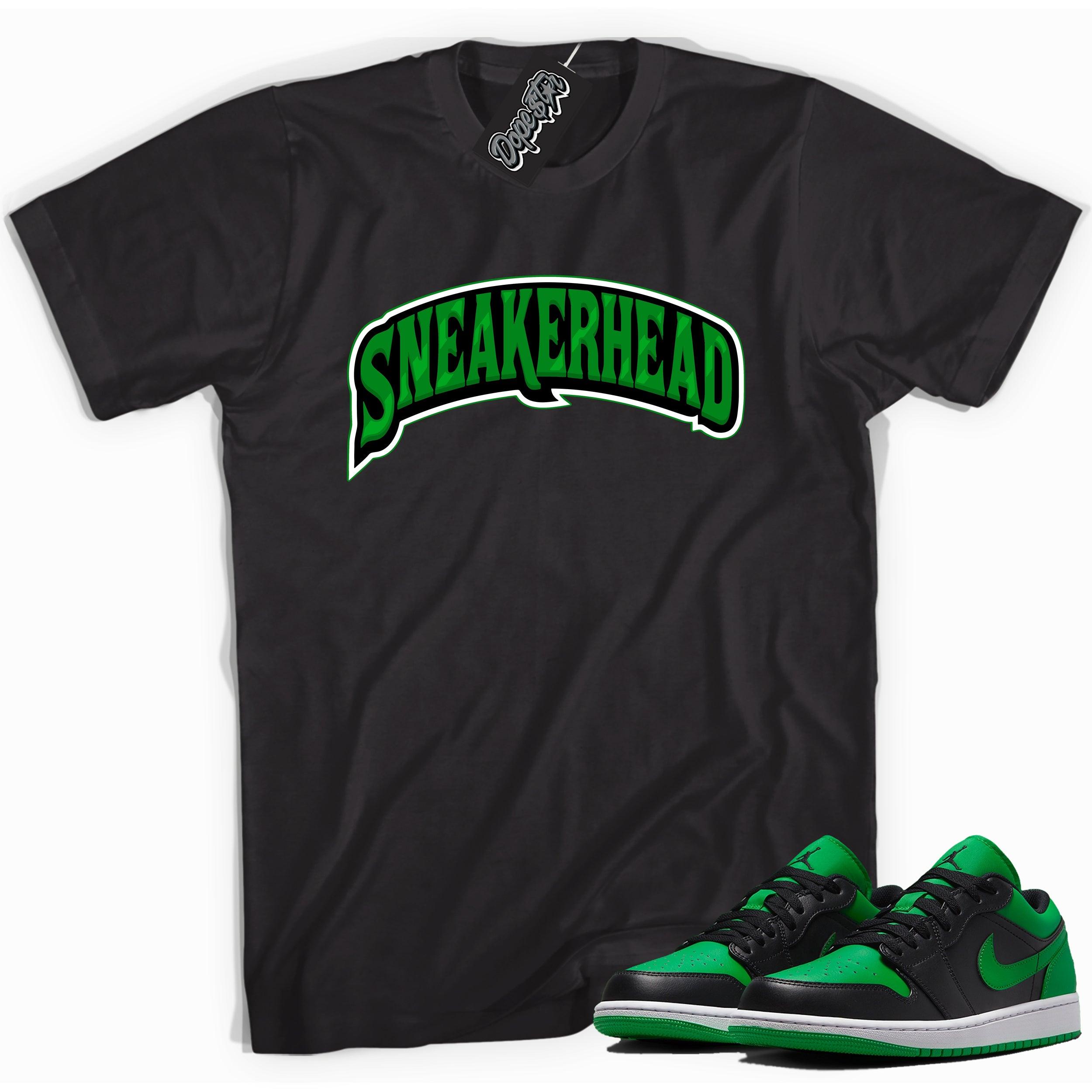 Cool black graphic tee with 'sneaker head' print, that perfectly matches Air Jordan 1 Low Lucky Green sneakers