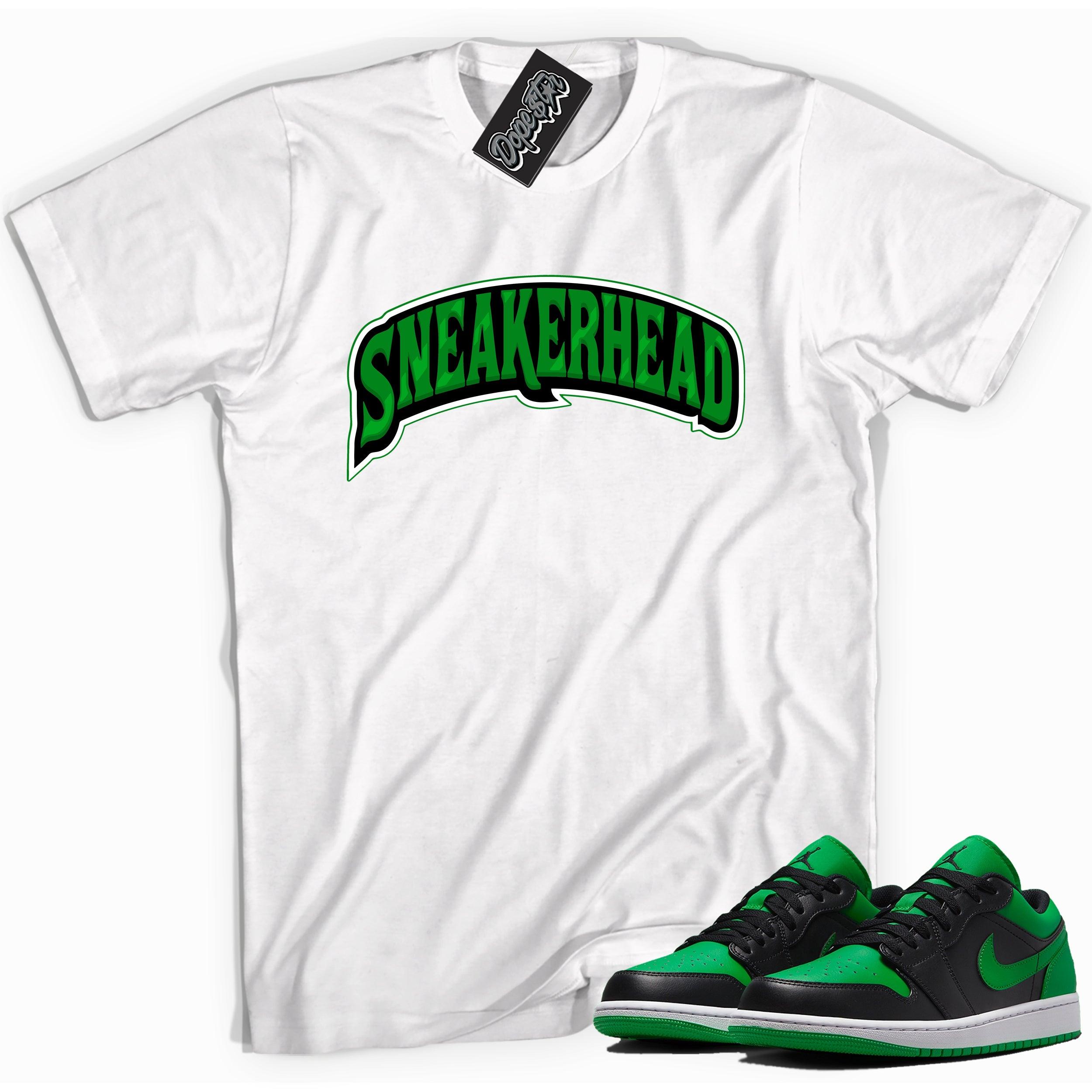 Cool white graphic tee with 'sneaker head' print, that perfectly matches Air Jordan 1 Low Lucky Green sneakers