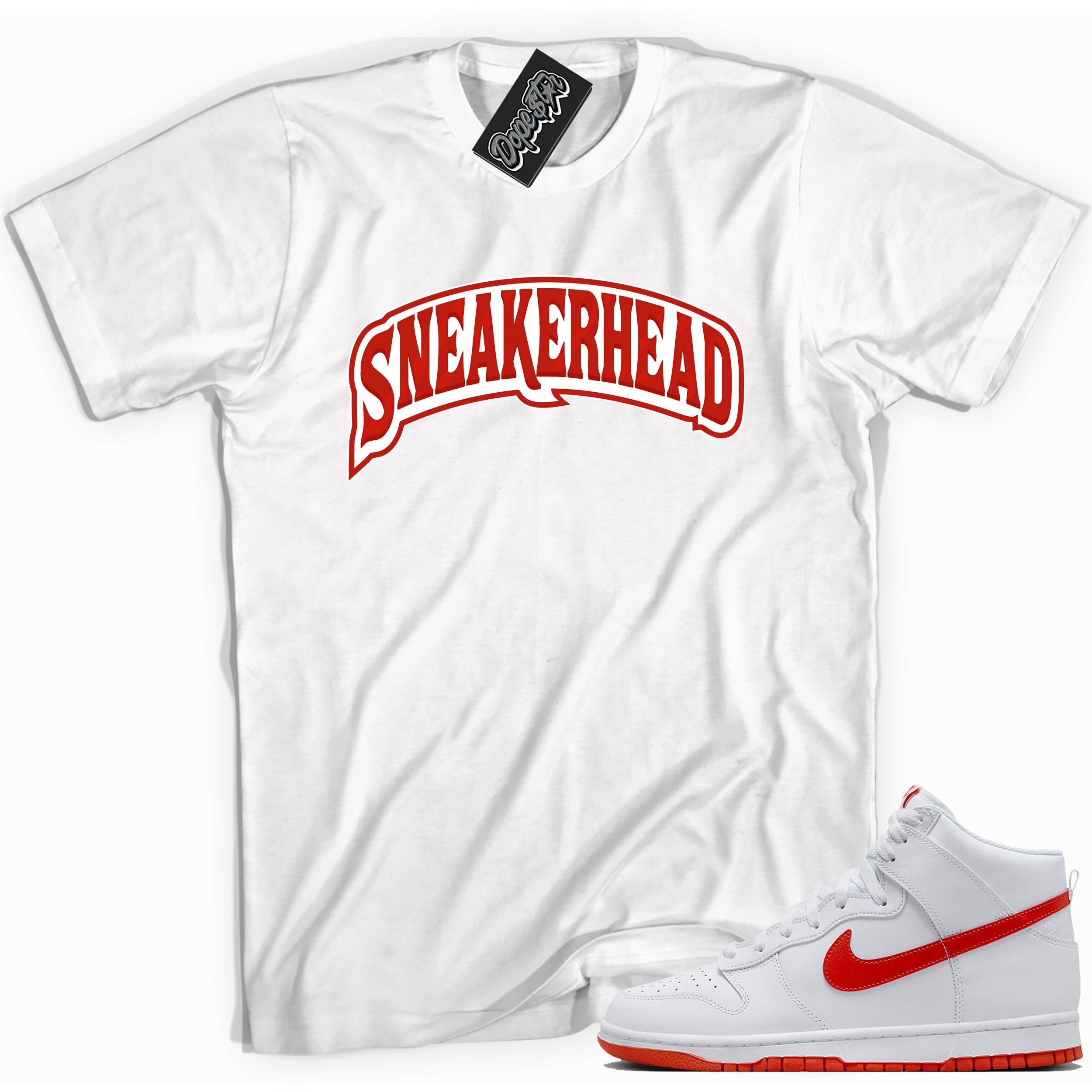 Cool white graphic tee with 'sneaker head' print, that perfectly matches Nike Dunk High White Picante Red sneakers.