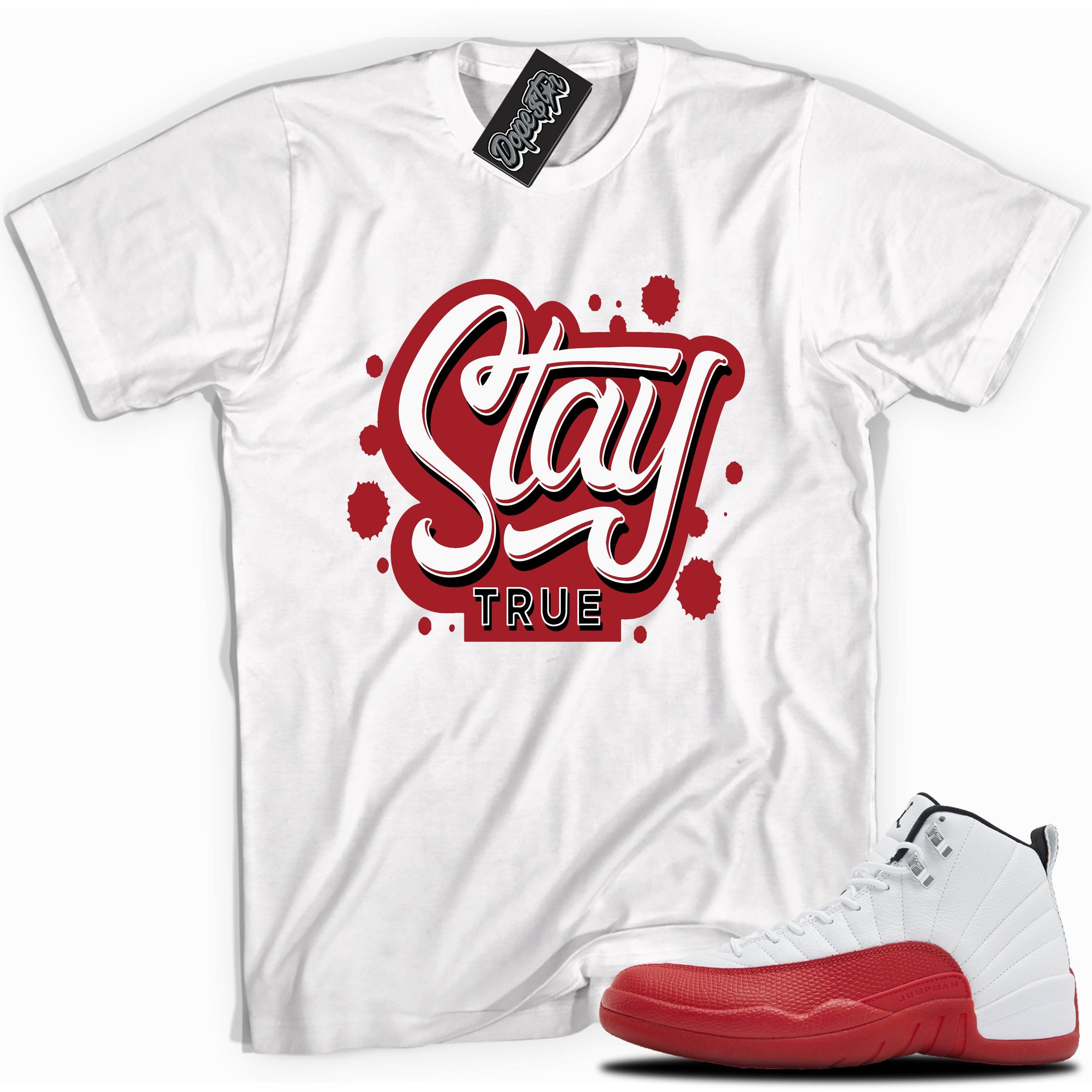 Cool White graphic tee with “Stay True” print, that perfectly matches Air Jordan 12 Retro Cherry Red 2023 red and white sneakers 