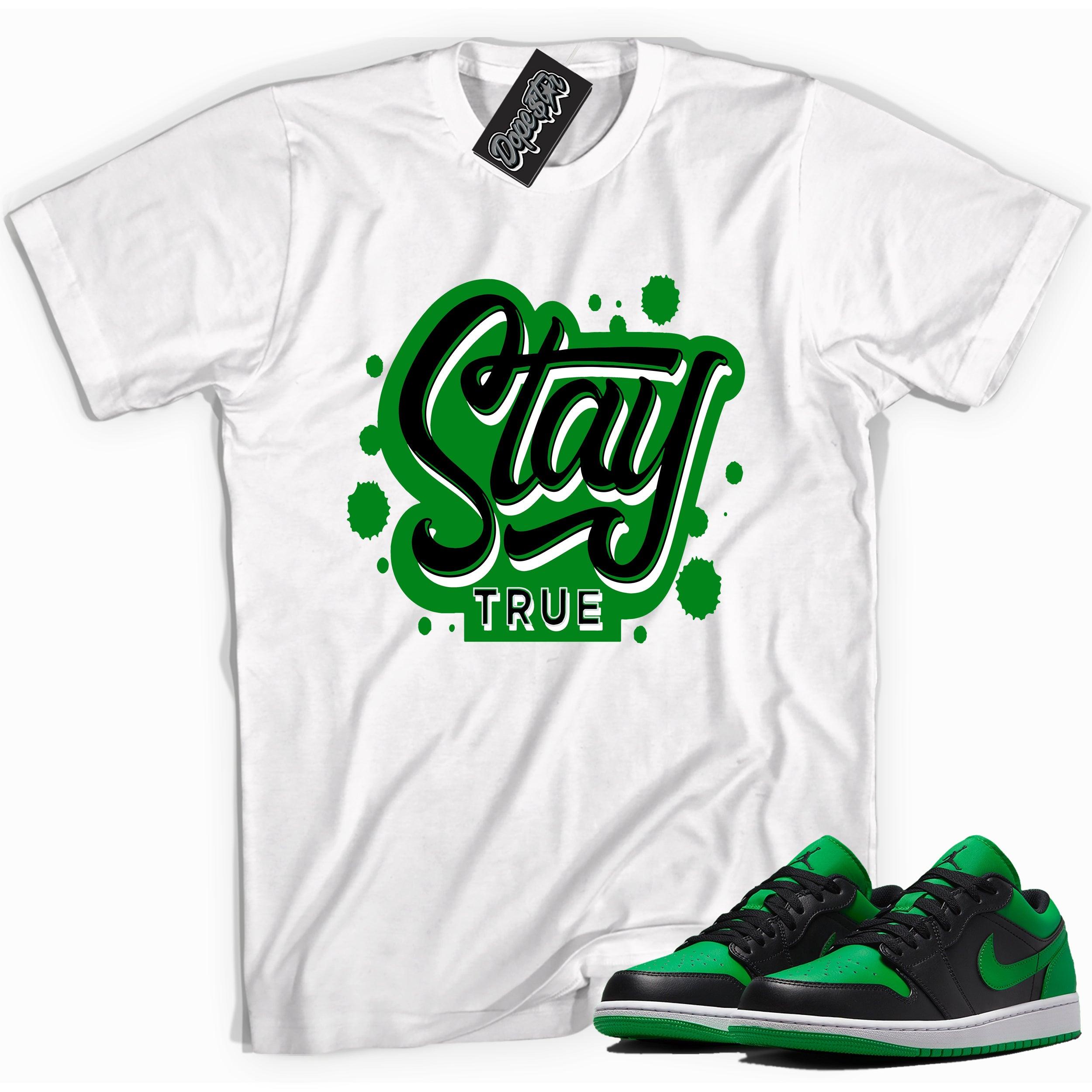 Cool white graphic tee with 'stay true' print, that perfectly matches Air Jordan 1 Low Lucky Green sneakers