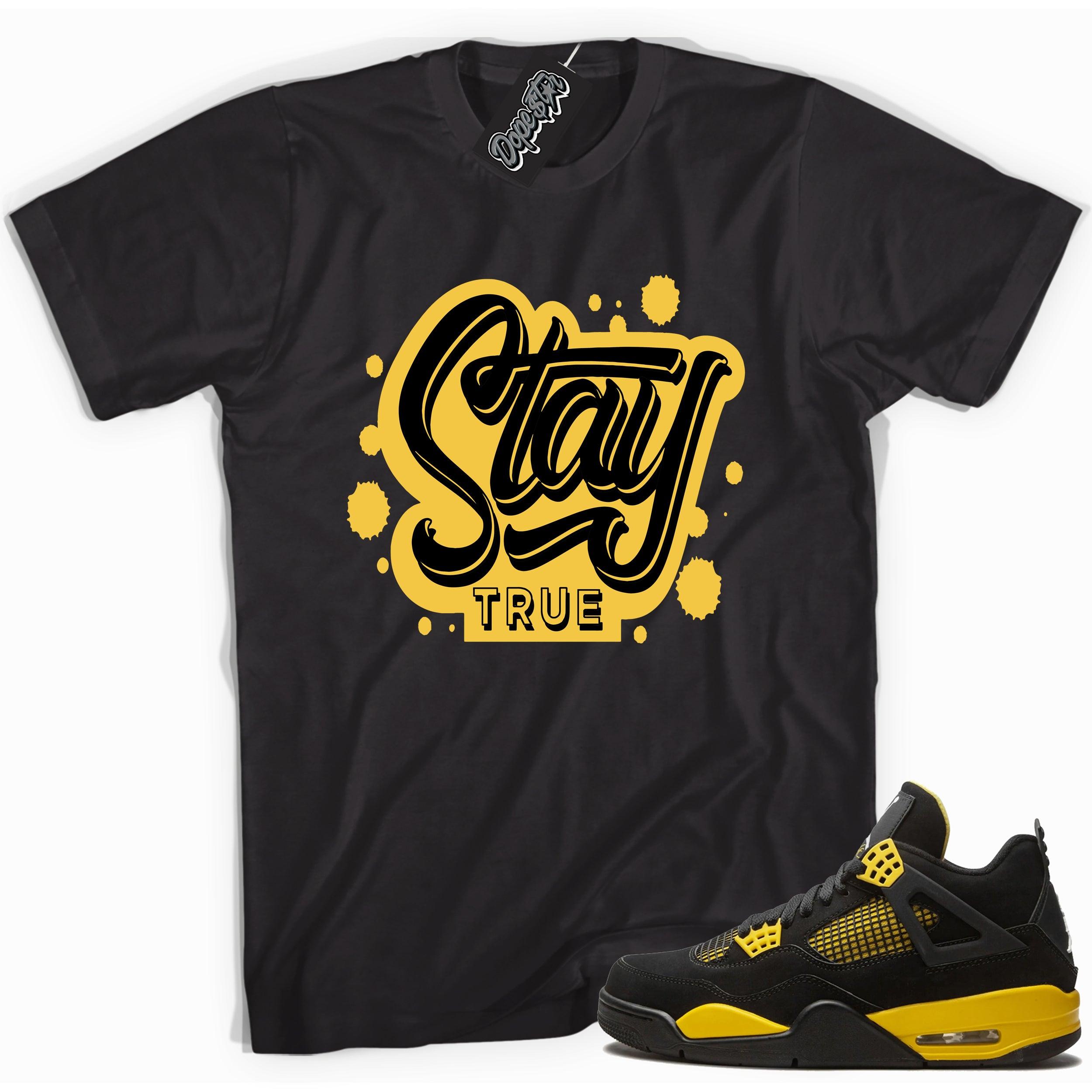 Cool black graphic tee with 'stay true' print, that perfectly matches  Air Jordan 4 Thunder sneakers