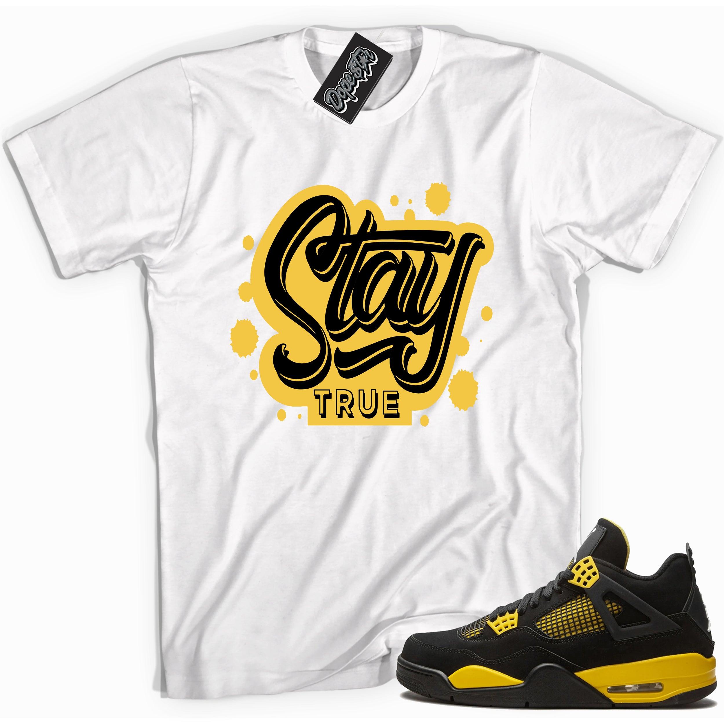 Cool white graphic tee with 'stay true' print, that perfectly matches Air Jordan 4 Thunder sneakers
