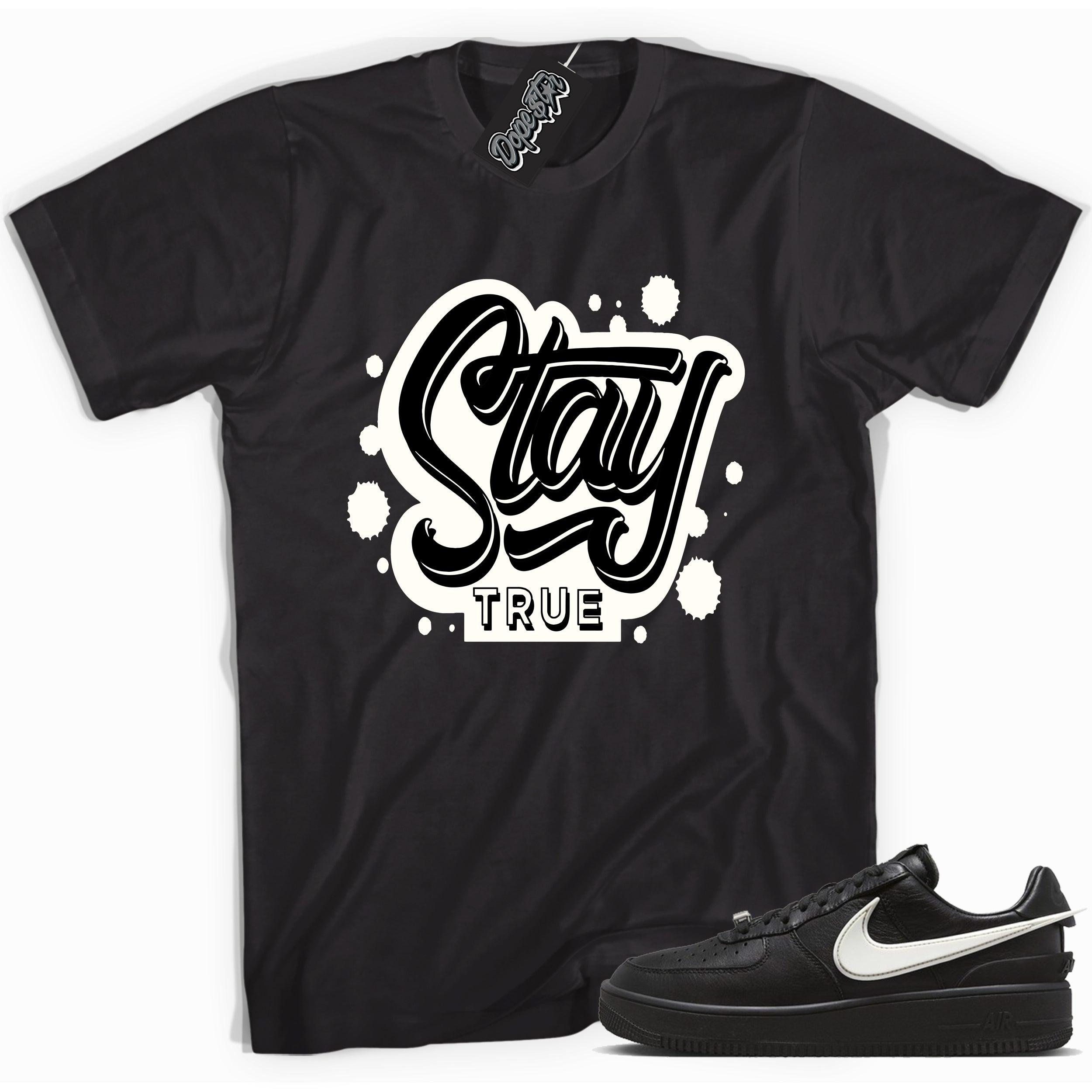 Cool black graphic tee with 'stay true' print, that perfectly matches Nike Air Force 1 Low SP Ambush Phantom sneakers.