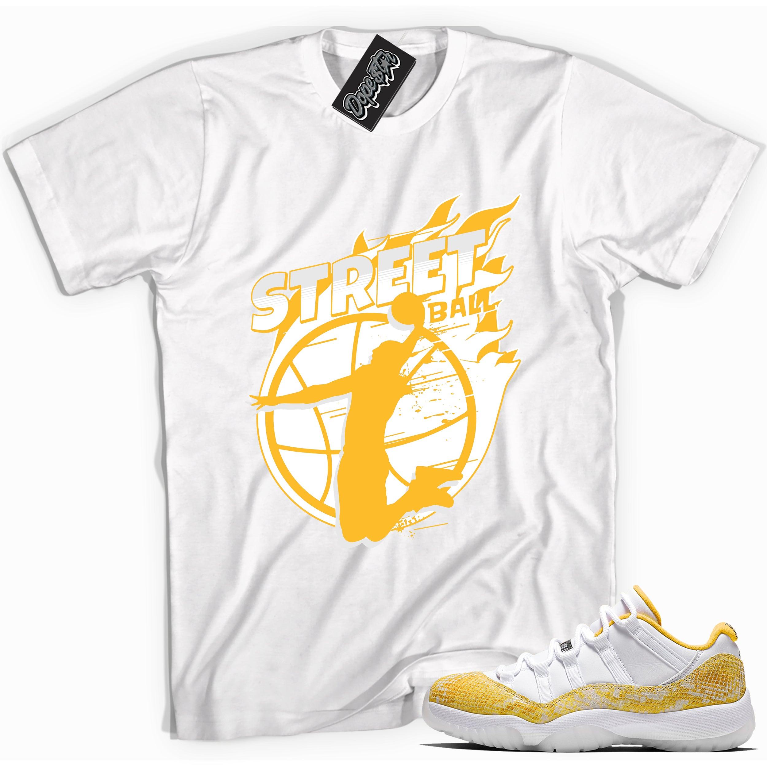 Cool white graphic tee with 'street ball' print, that perfectly matches Air Jordan 11 Retro Low Yellow Snakeskin sneakers