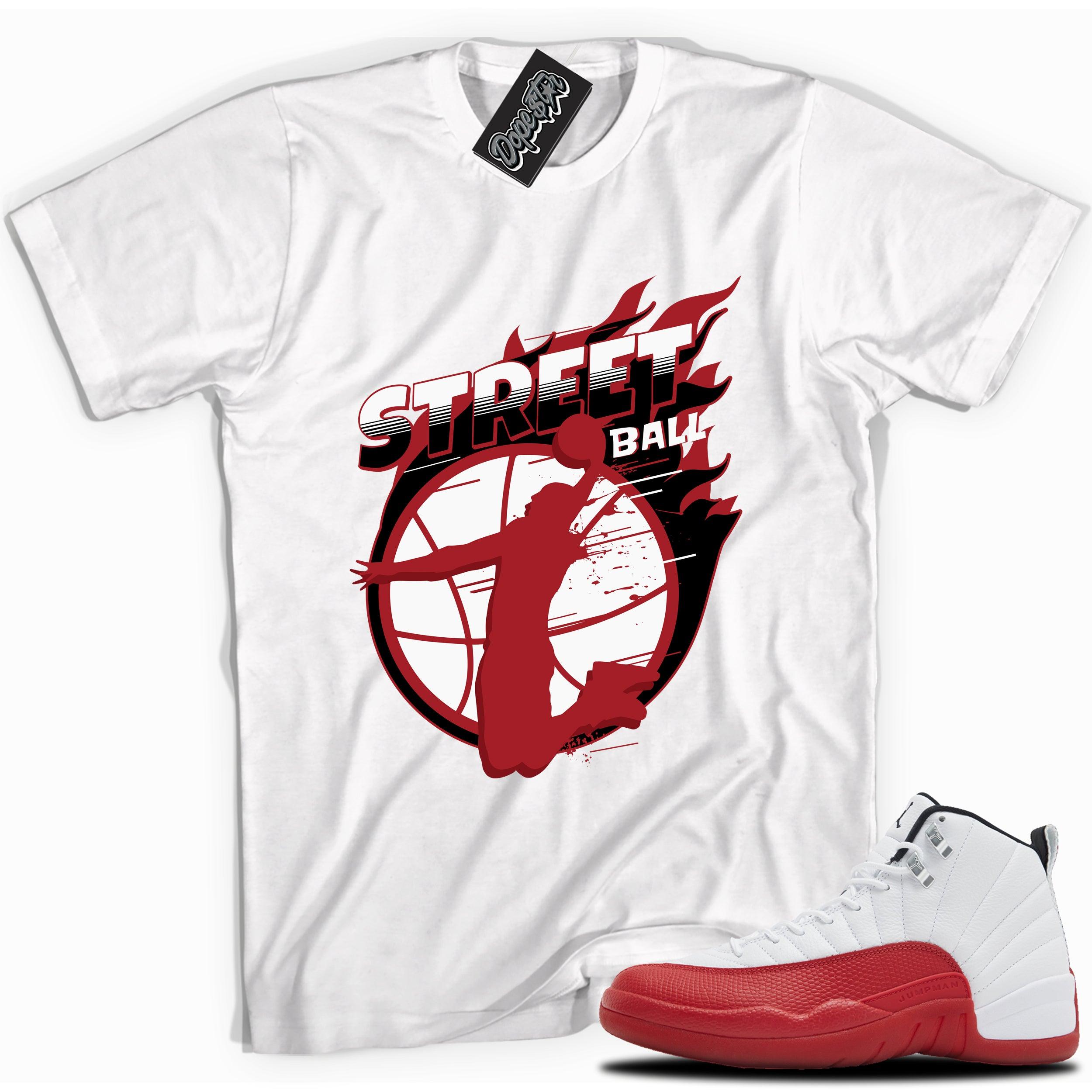 Cool White graphic tee with “Street Ball” print, that perfectly matches Air Jordan 12 Retro Cherry Red 2023 red and white sneakers 
