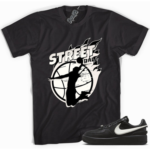 Cool black graphic tee with 'street ball' print, that perfectly matches Nike Air Force 1 Low SP Ambush Phantom sneakers.