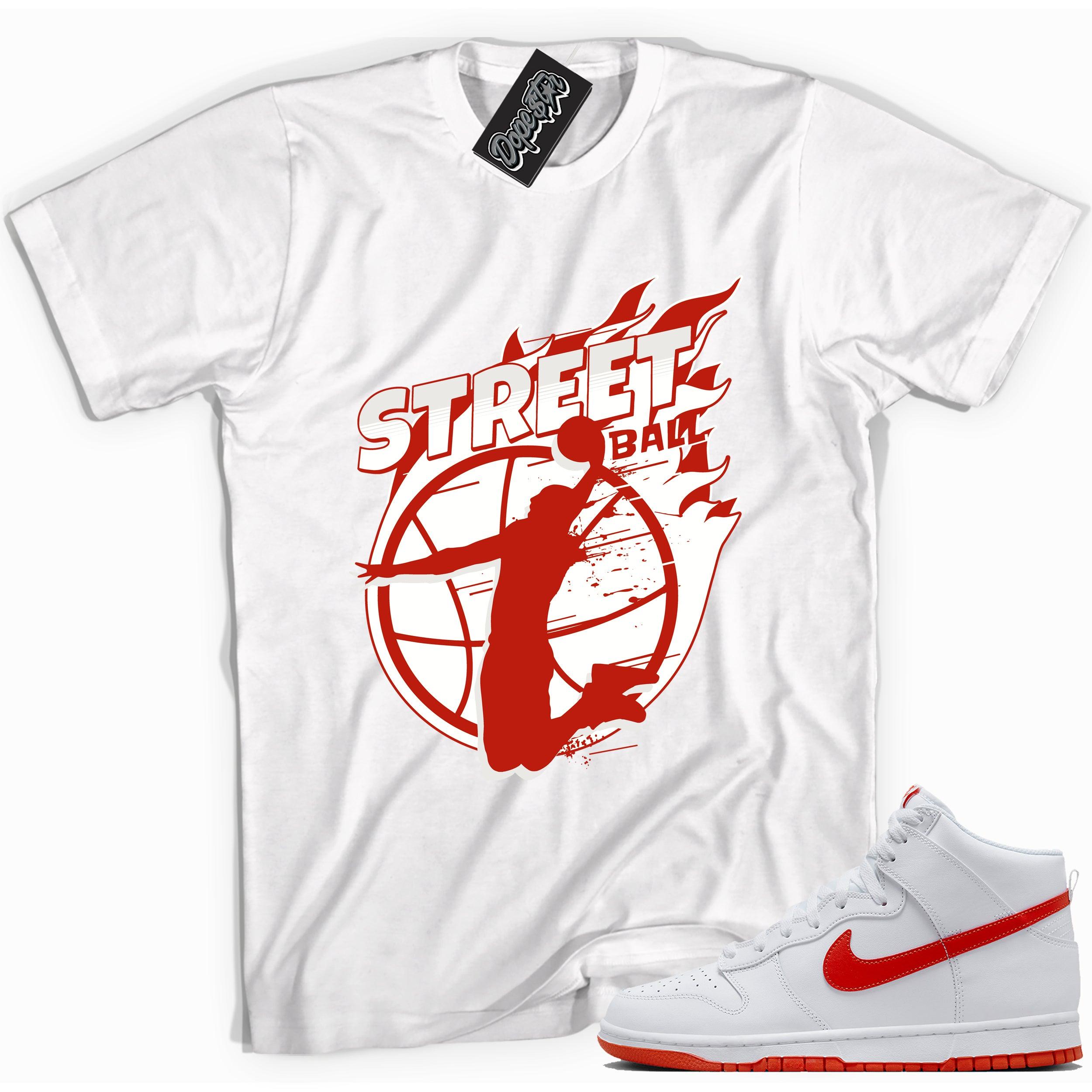 Cool white graphic tee with 'street ball' print, that perfectly matches Nike Dunk High White Picante Red sneakers.