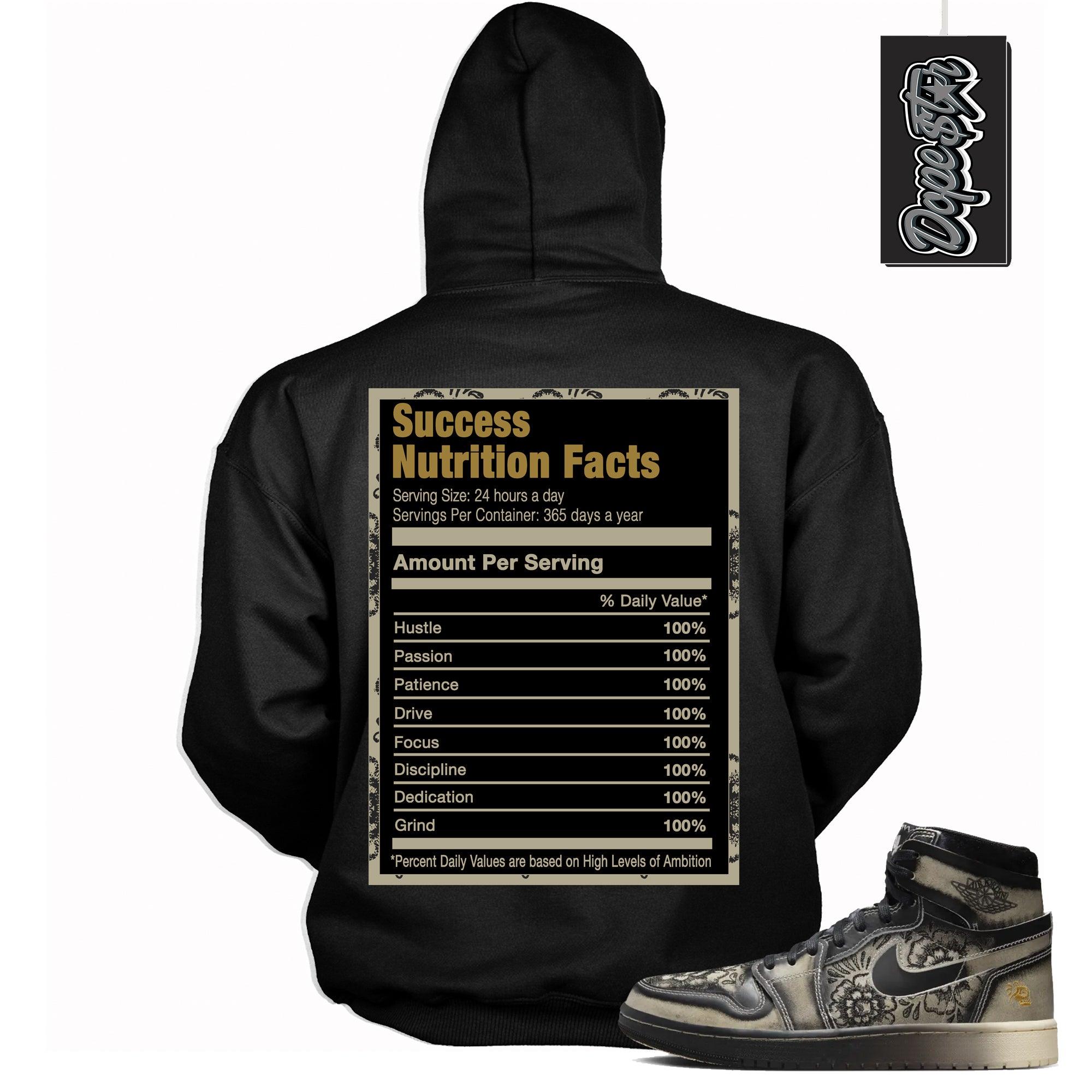 Cool Black Graphic Hoodie with “ Success Nutrition “ print, that perfectly matches Air Jordan 1 High Zoom Comfort 2 Dia de Muertos Black and Pale Ivory sneakers