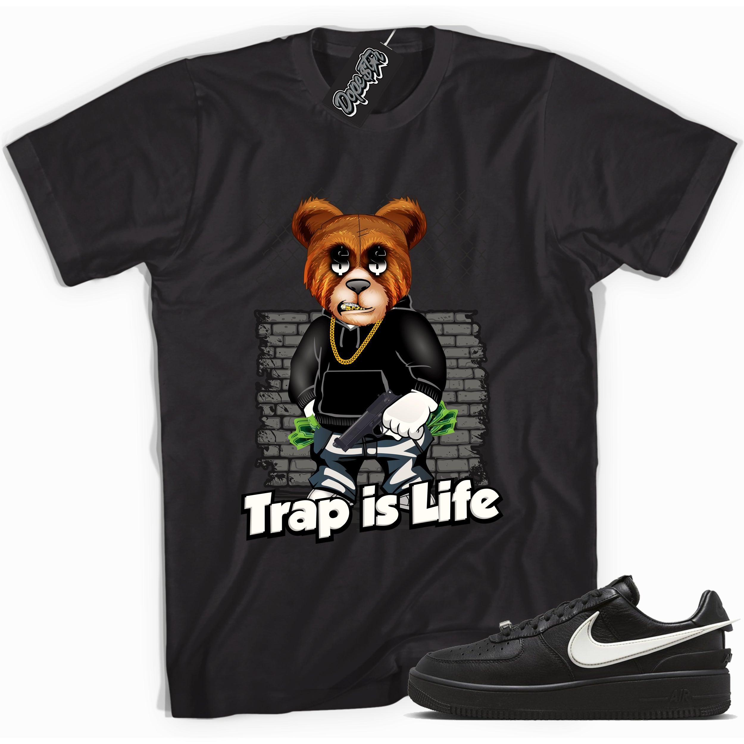 Cool black graphic tee with 'trap is life' print, that perfectly matches Nike Air Force 1 Low SP Ambush Phantom sneakers.