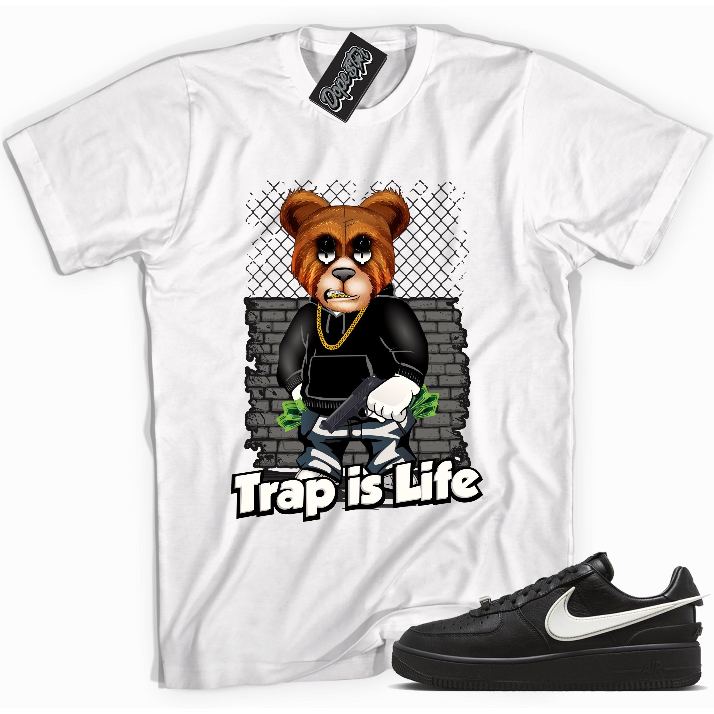Cool white graphic tee with 'trap is life' print, that perfectly matches Nike Air Force 1 Low SP Ambush Phantom sneakers.