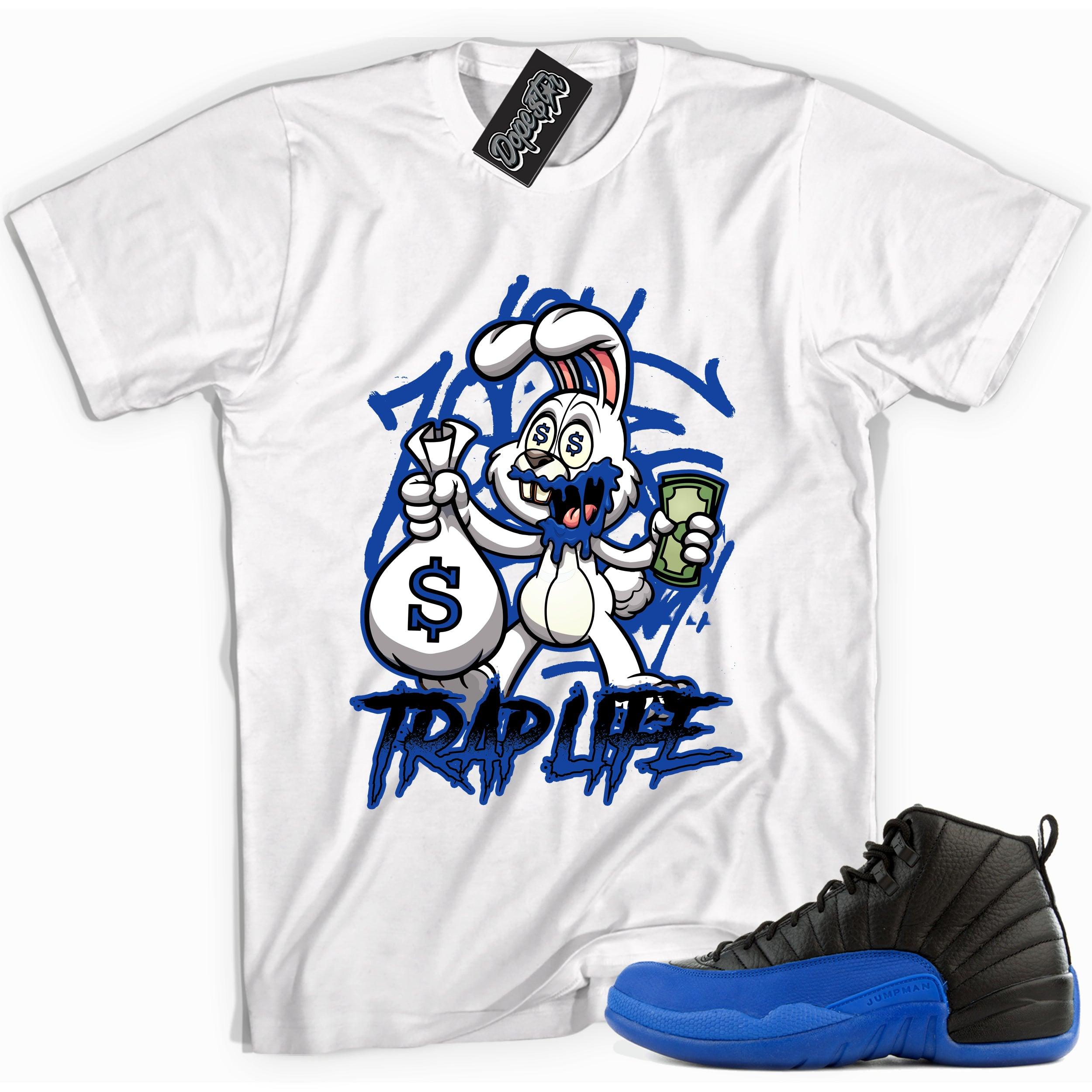 Cool white graphic tee with 'trap rabbit' print, that perfectly matches Air Jordan 12 Retro Black Game Royal sneakers.