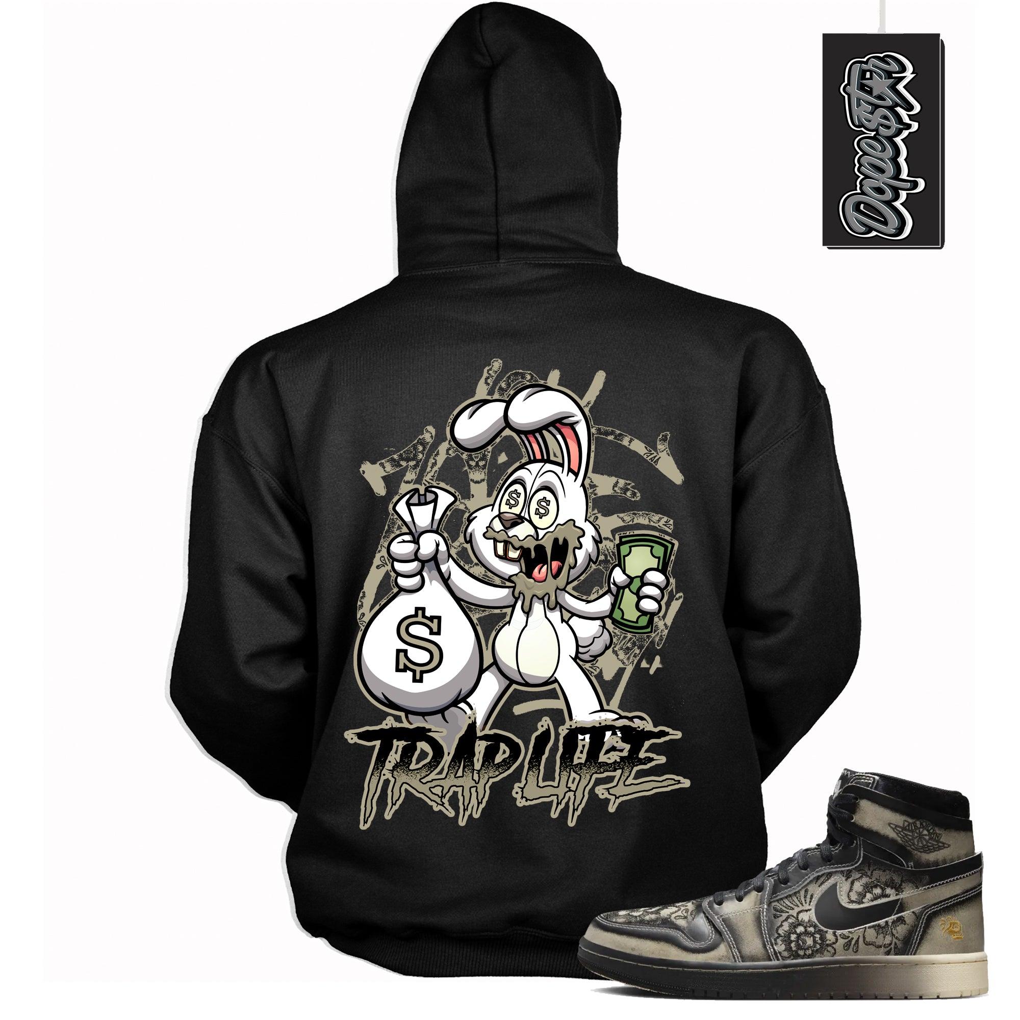Cool Black Graphic Hoodie with “ Trap Rabbit“ print, that perfectly matches Air Jordan 1 High Zoom Comfort 2 Dia de Muertos Black and Pale Ivory sneakers