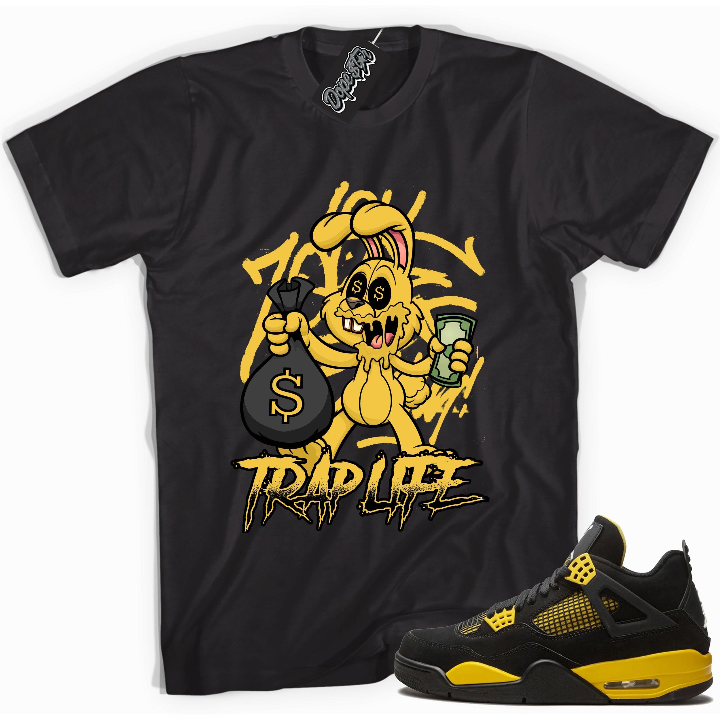 Cool black graphic tee with 'trap rabbit' print, that perfectly matches  Air Jordan 4 Thunder sneakers