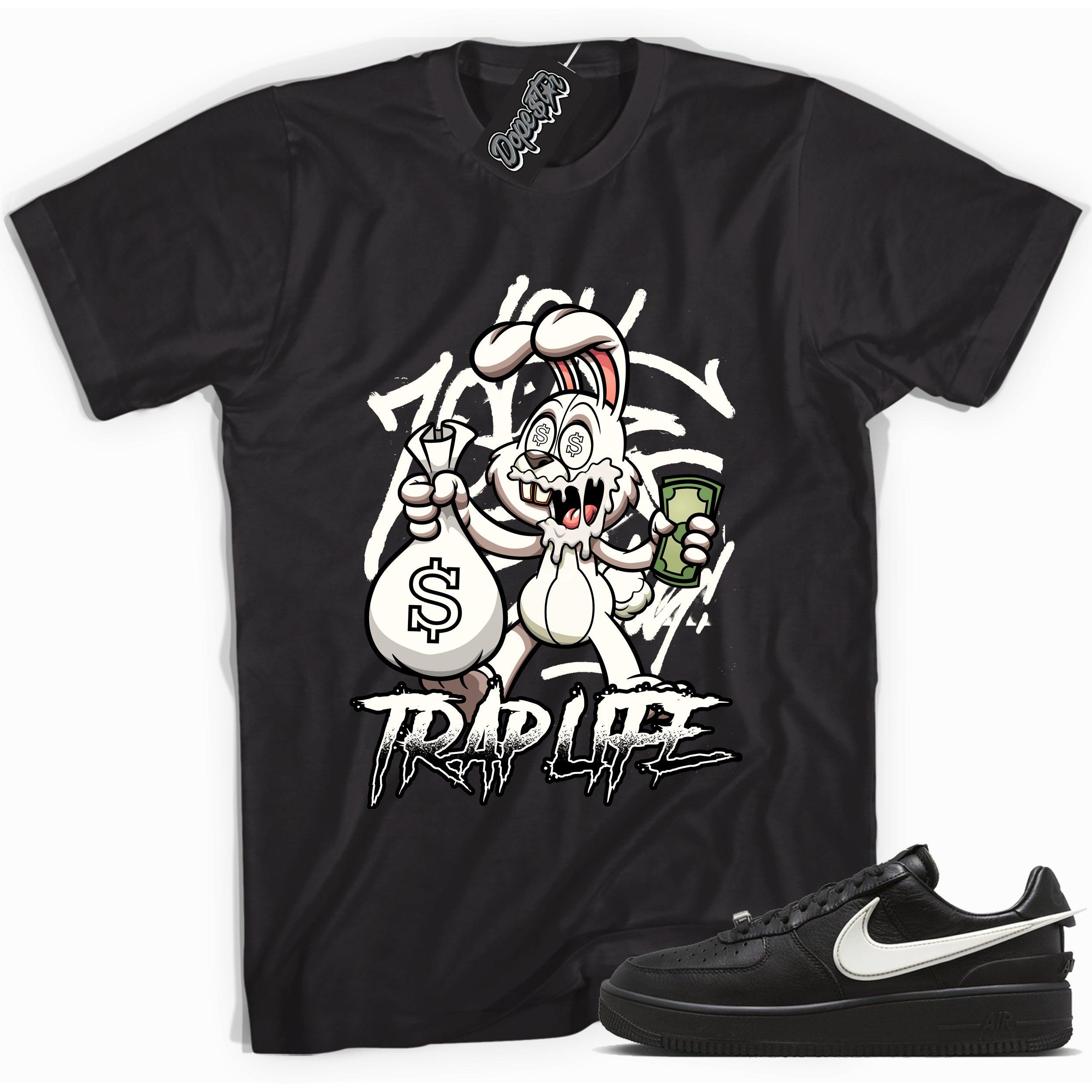 Cool black graphic tee with 'trap rabbit' print, that perfectly matches Nike Air Force 1 Low SP Ambush Phantom sneakers.