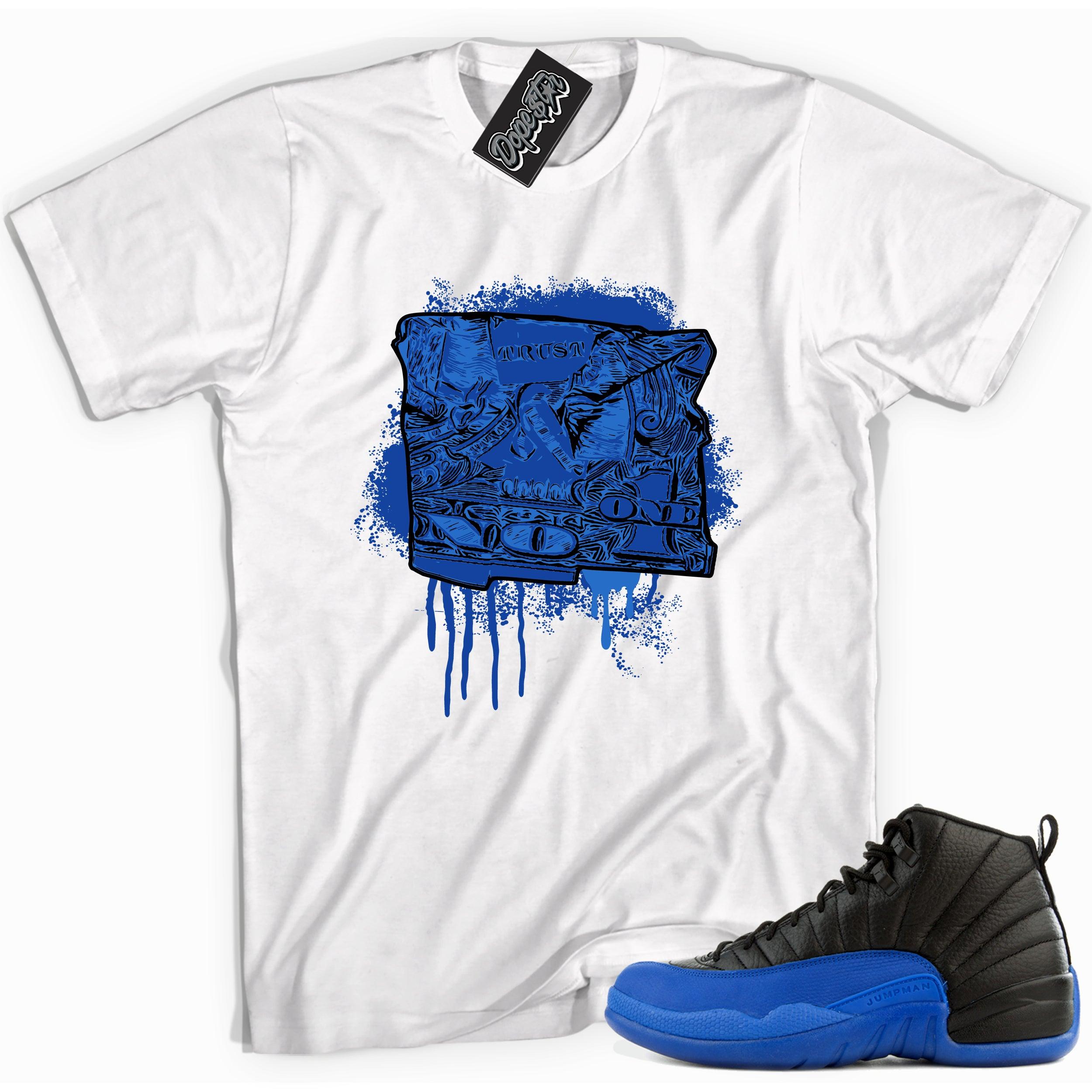 Cool white graphic tee with 'trust no one' print, that perfectly matches Air Jordan 12 Retro Black Game Royal sneakers.