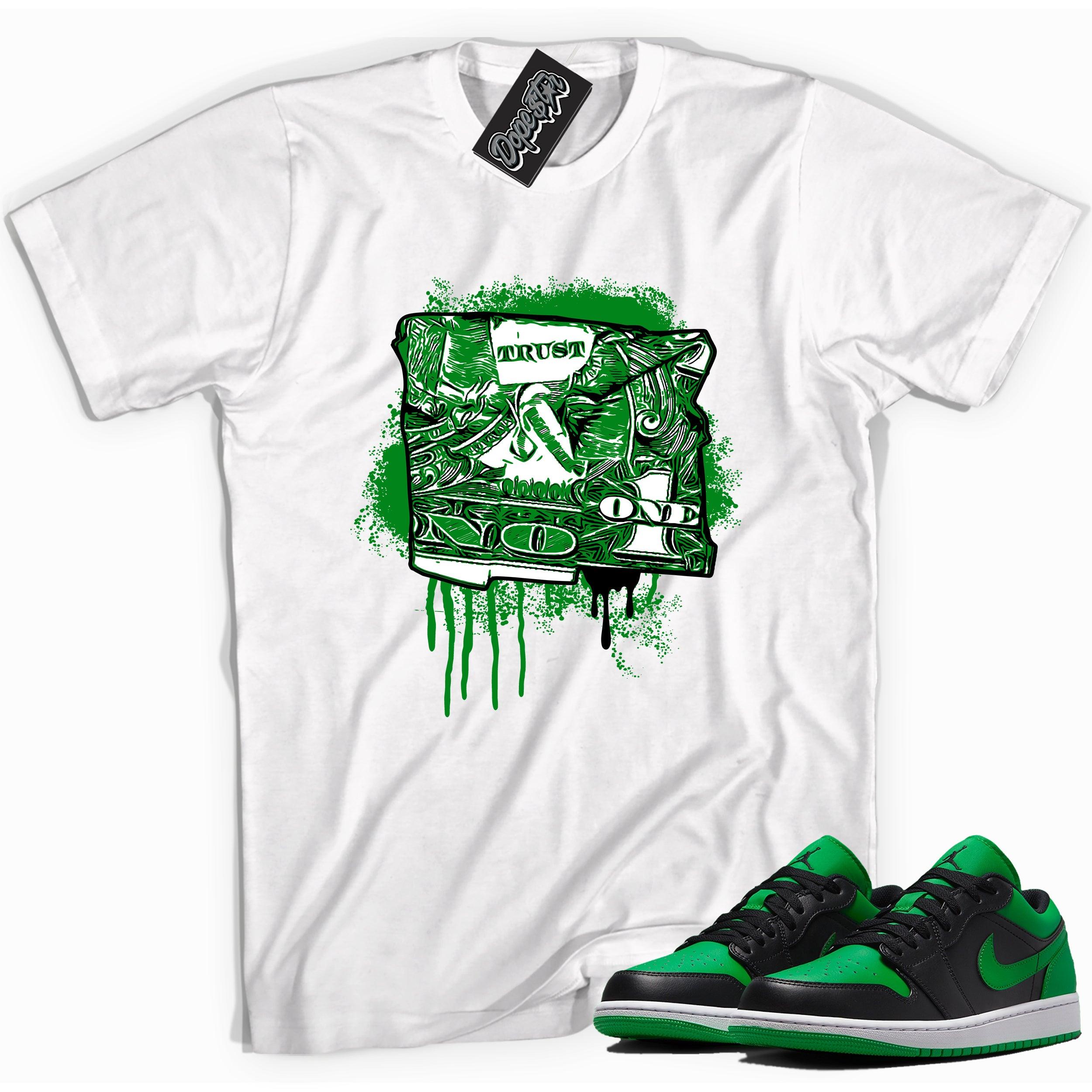 Cool white graphic tee with 'trust no one dollar' print, that perfectly matches Air Jordan 1 Low Lucky Green sneakers