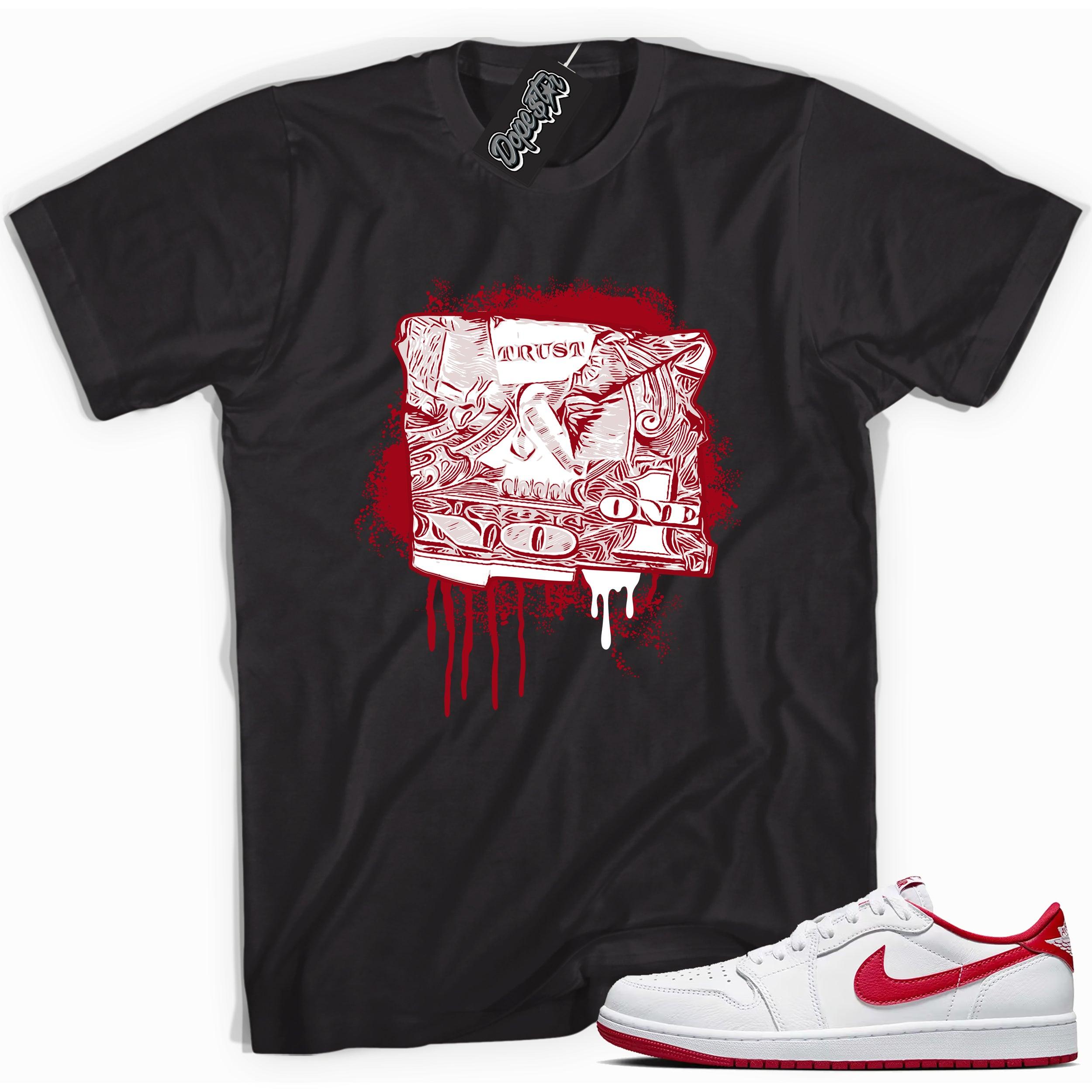 Cool Black graphic tee with “ Trust No One Dollar ” print, that perfectly matches Air Jordan 1 Retro Low OG University Red and white sneakers 