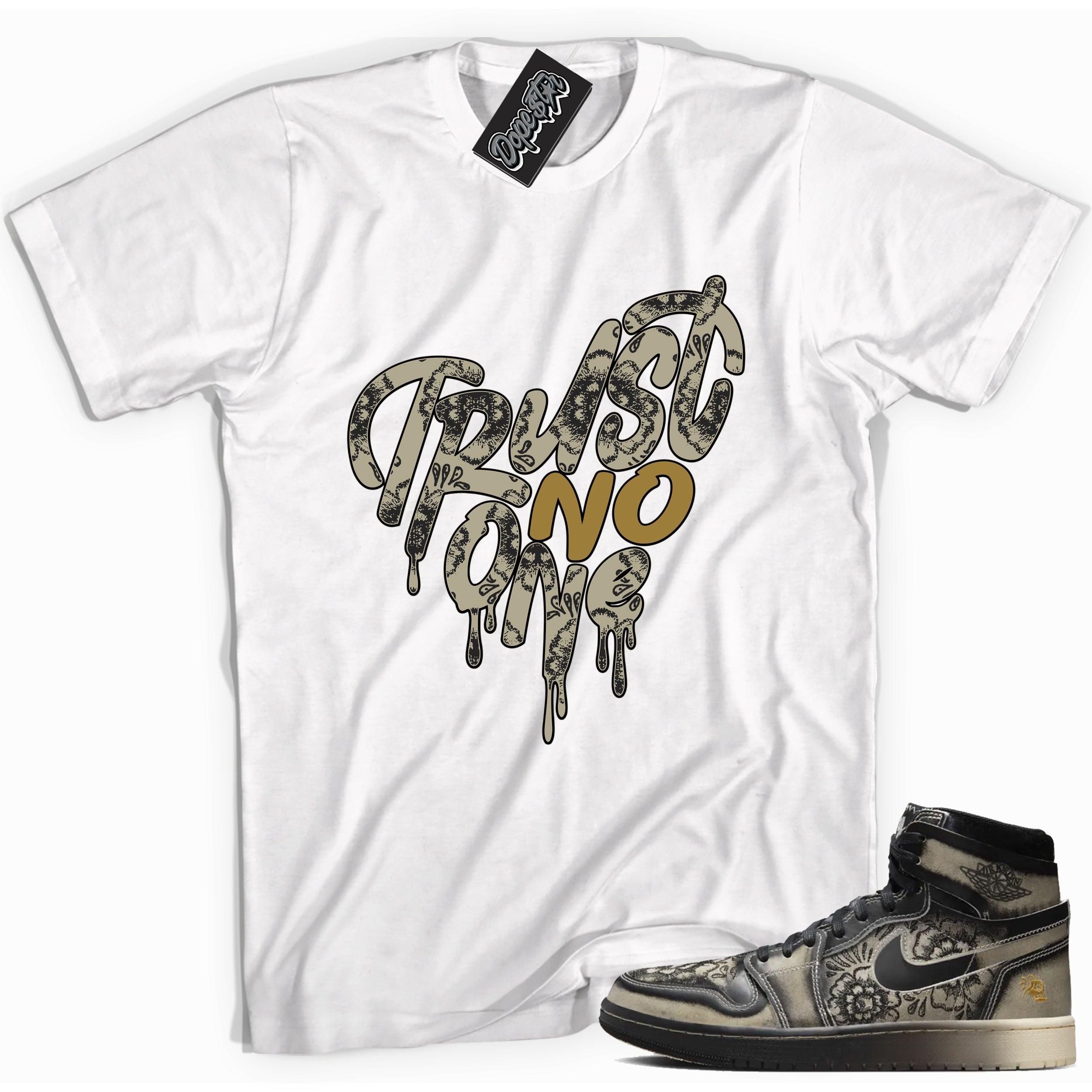 Cool White graphic tee with “ Trust No One Heart ” print, that perfectly matches Air Jordan 1 High Zoom Comfort 2 Dia de Muertos Black and Pale Ivory sneakers 