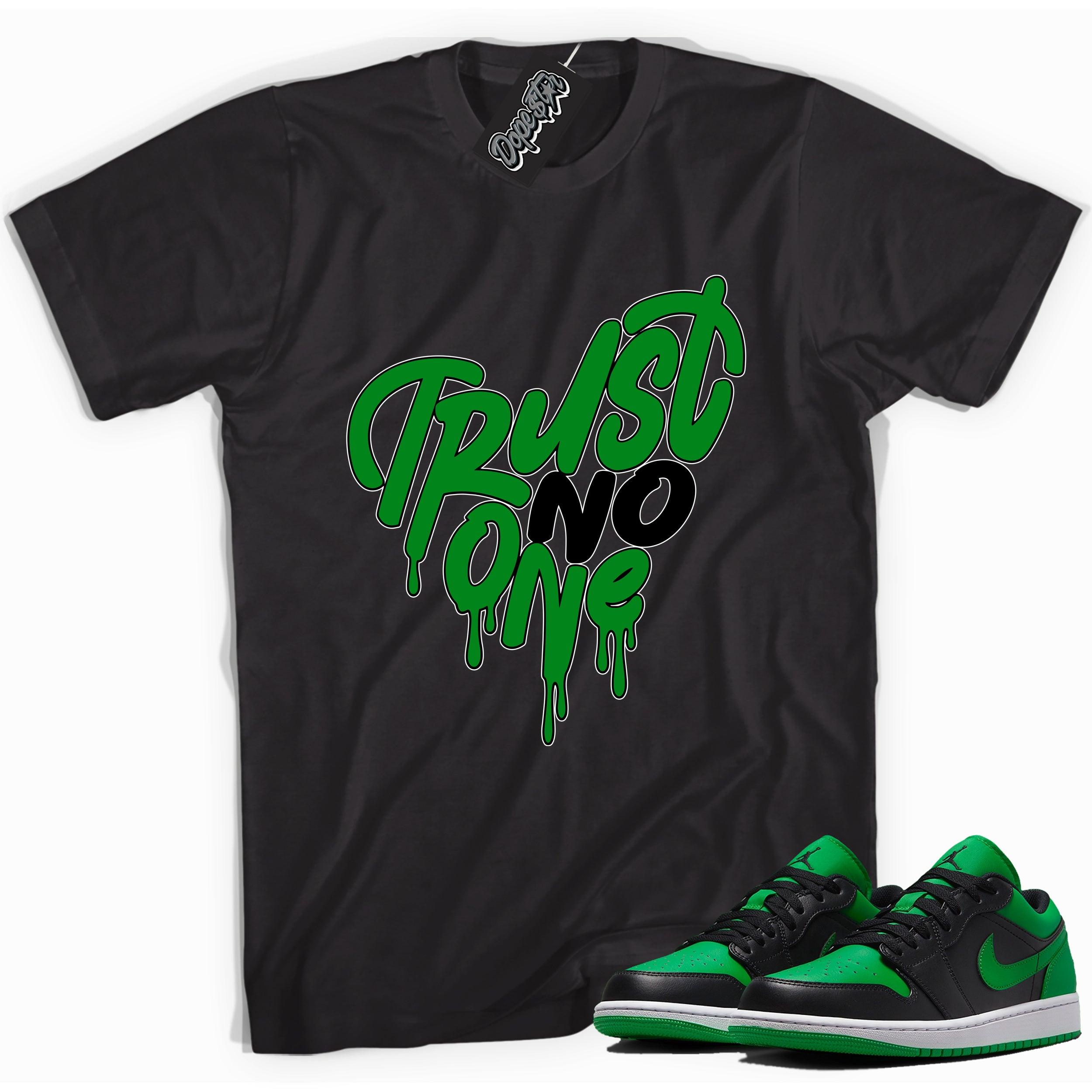 Cool black graphic tee with 'trust no one' print, that perfectly matches Air Jordan 1 Low Lucky Green sneakers