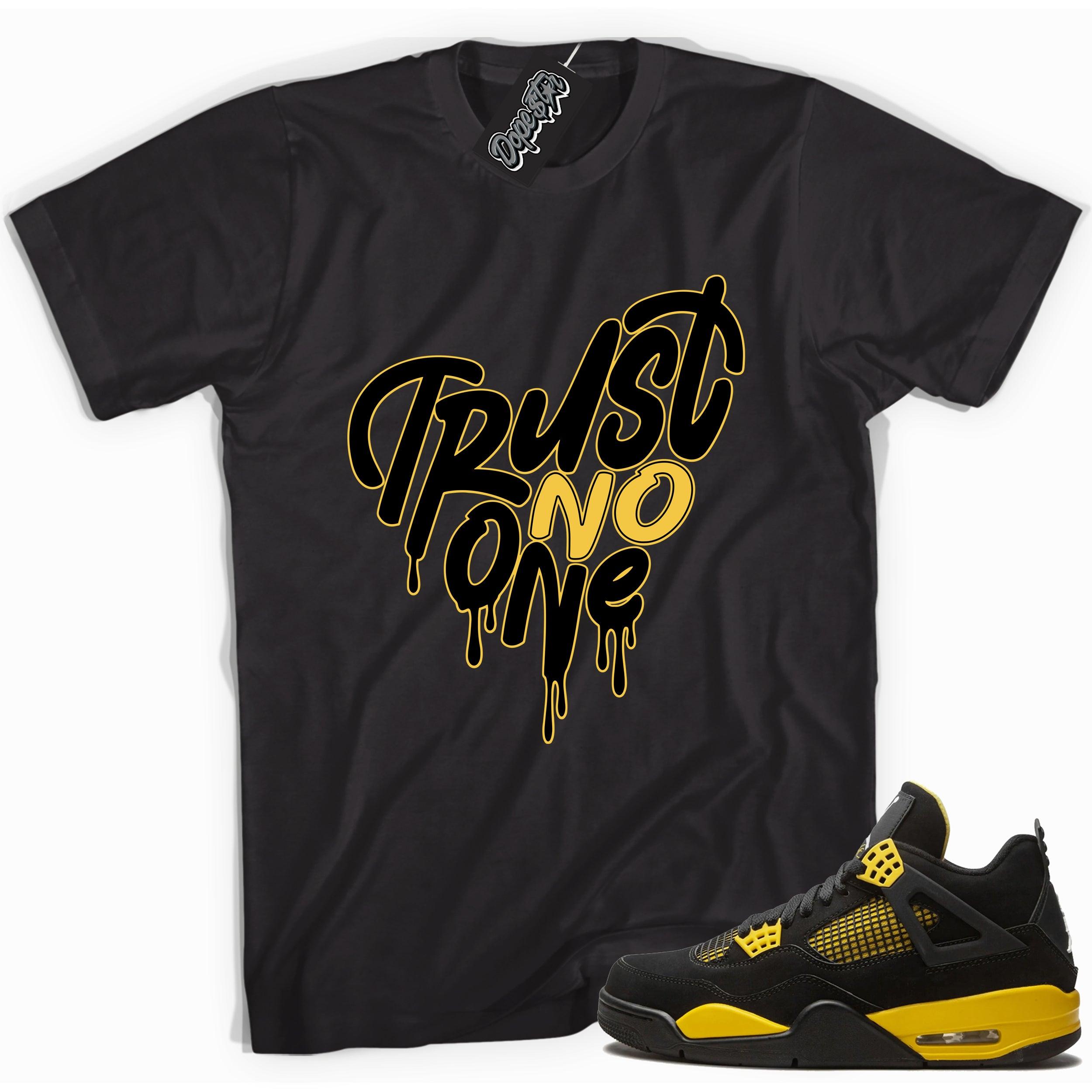 Cool black graphic tee with 'trust no one heart' print, that perfectly matches  Air Jordan 4 Thunder sneakers