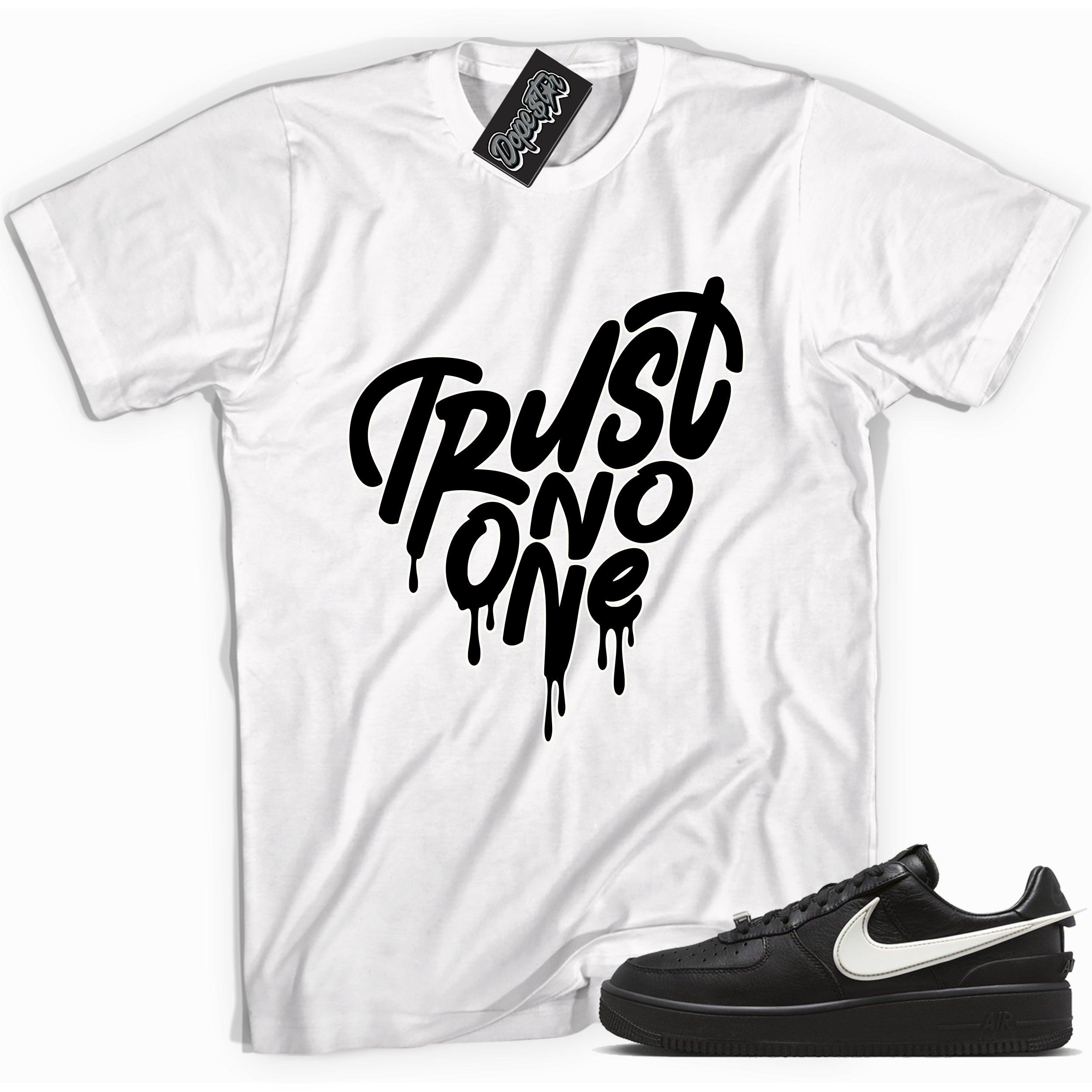 Cool white graphic tee with 'trust no one heart' print, that perfectly matches Nike Air Force 1 Low SP Ambush Phantom sneakers.