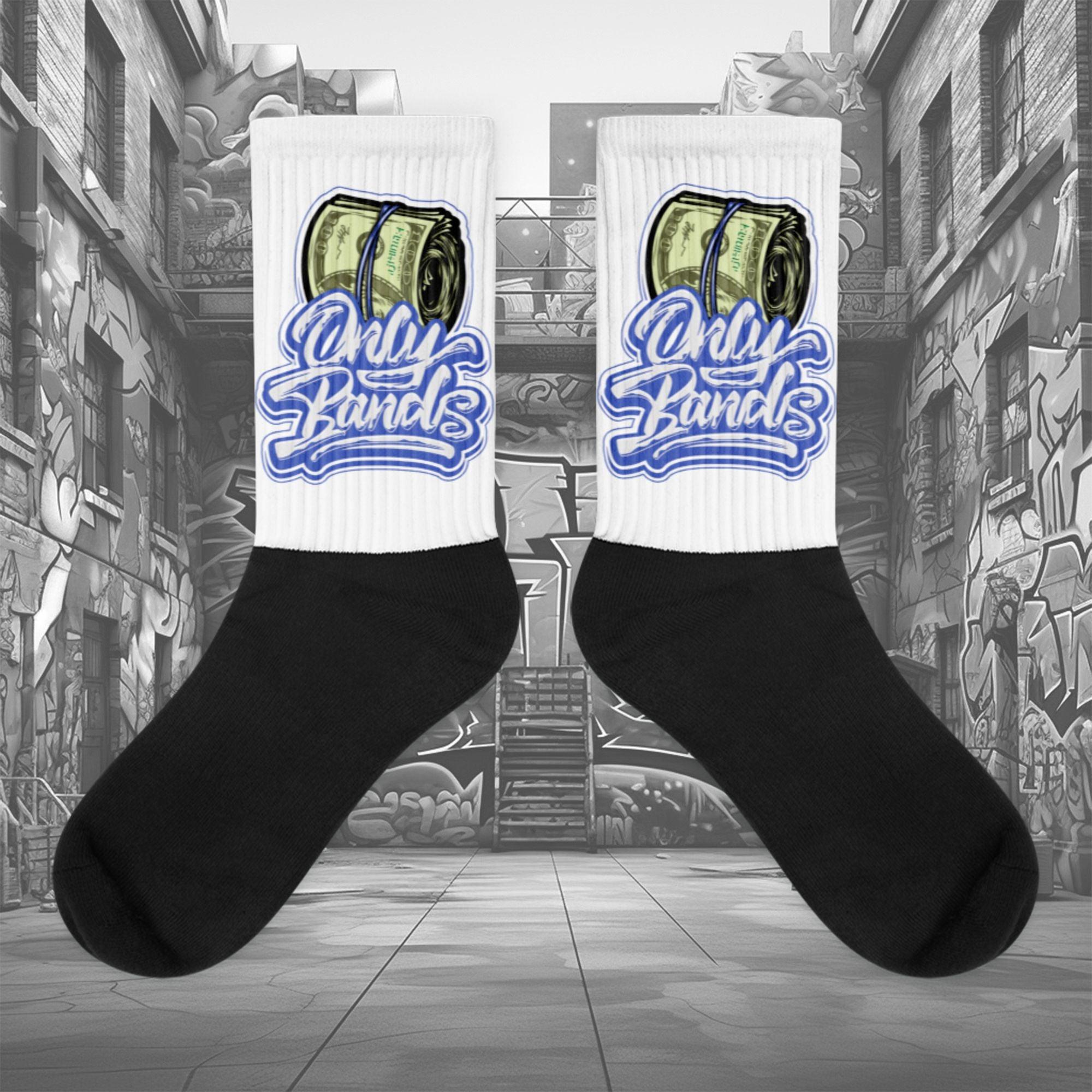  Showcases the view of the socks, highlighting the vibrant ' MEDUSA ' design, which perfectly complements the Nike Dunk Disrupt 2 Hyper Royal sneakers. The intricate pattern and color scheme inspired by the  theme are prominently displayed.  Focusing on the ribbed leg , cusioned bottoms and the snug fit of the socks. This angle provides a clear view of the texture and quality of the material blend.